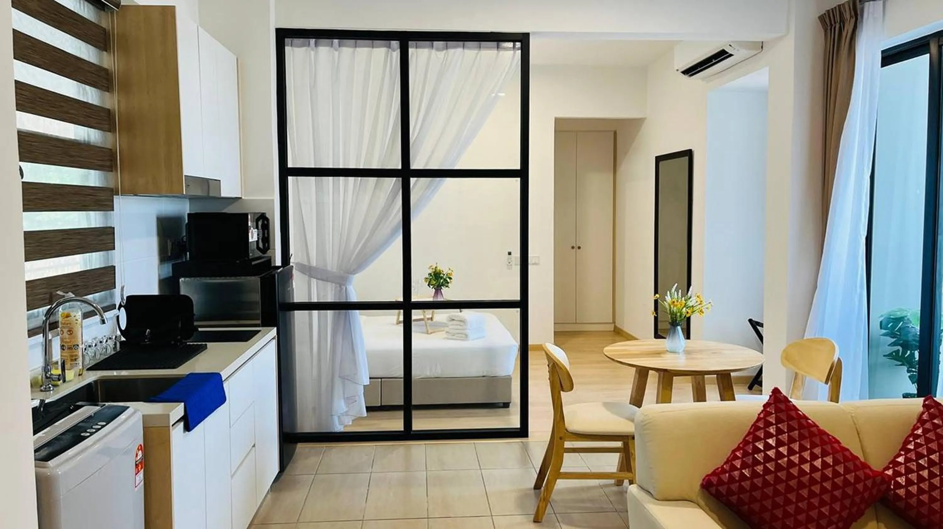 Dining area in Mutiara Melaka Beach Paradise by Glex