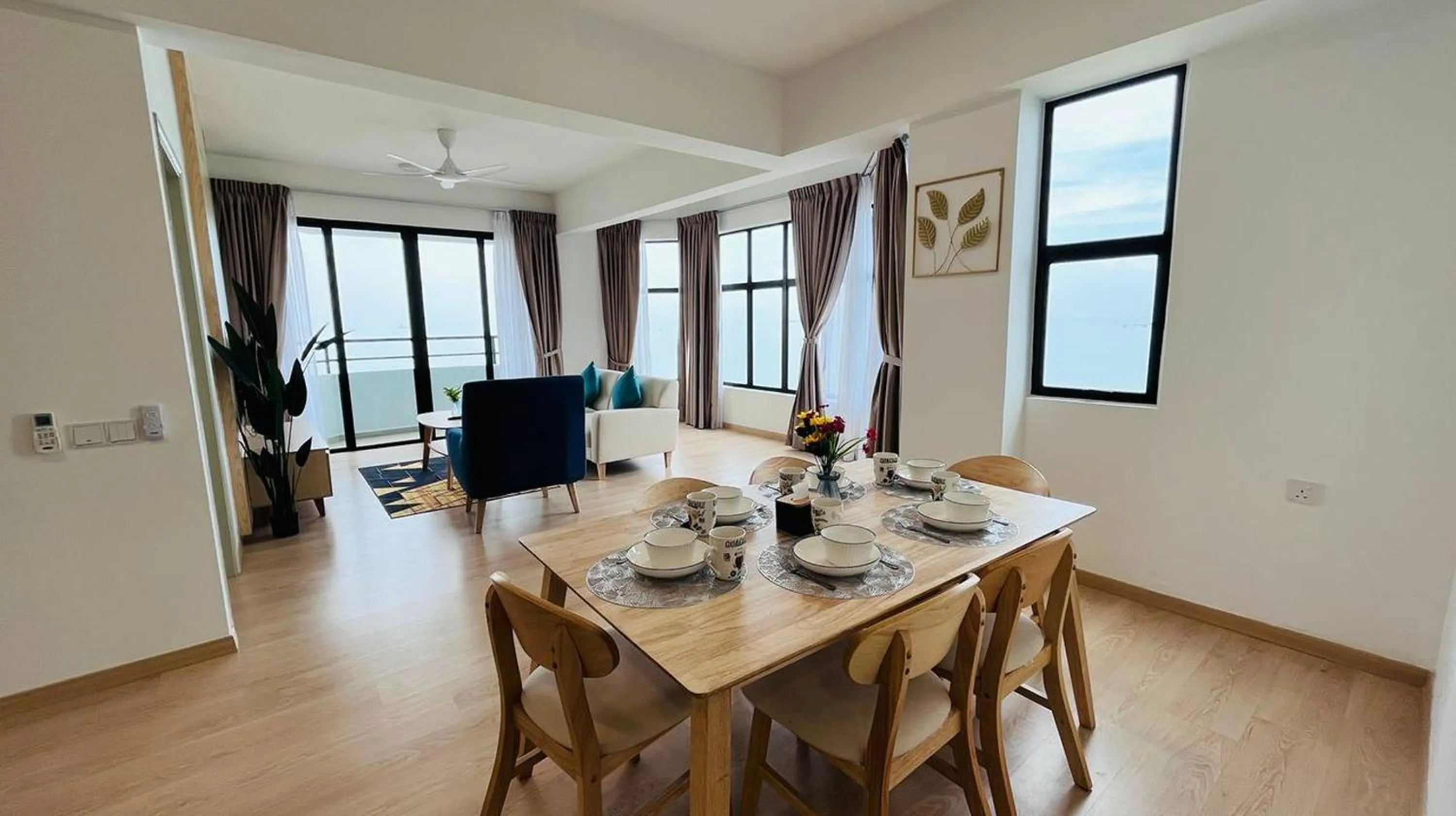 Dining area in Mutiara Melaka Beach Paradise by Glex