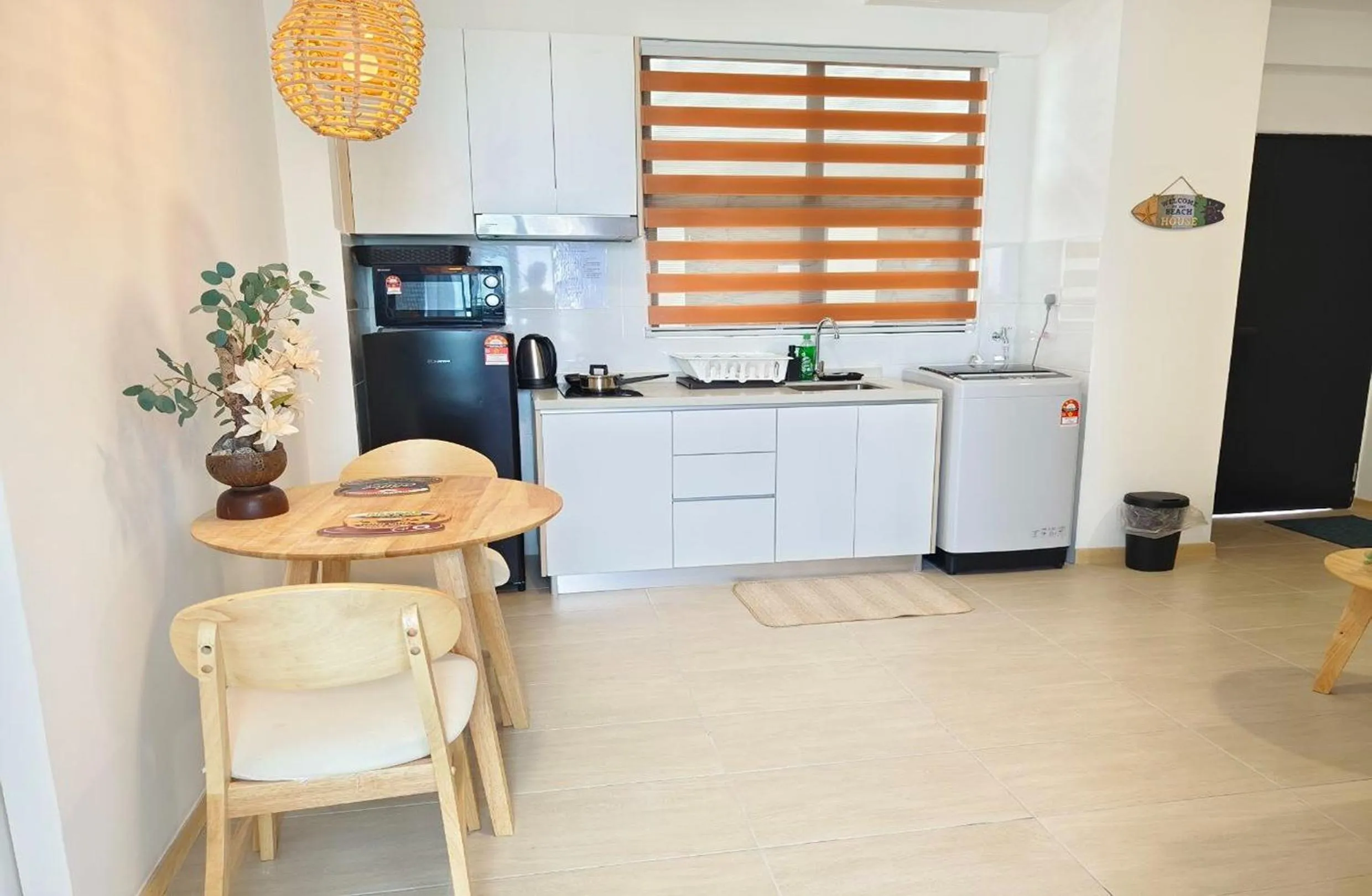 Kitchen or kitchenette in Mutiara Melaka Beach Paradise by Glex