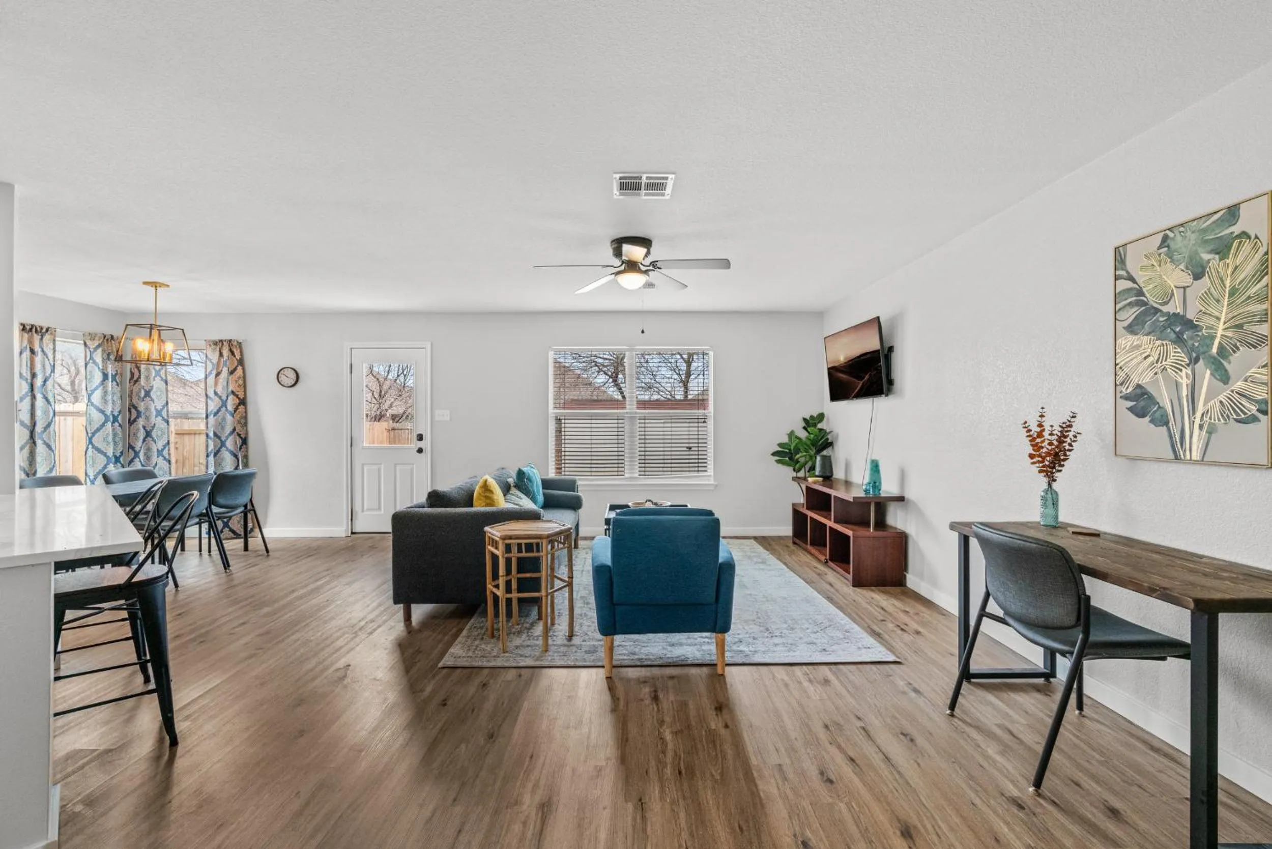 Living room in Modern, family friendly home w garage, huge yard!