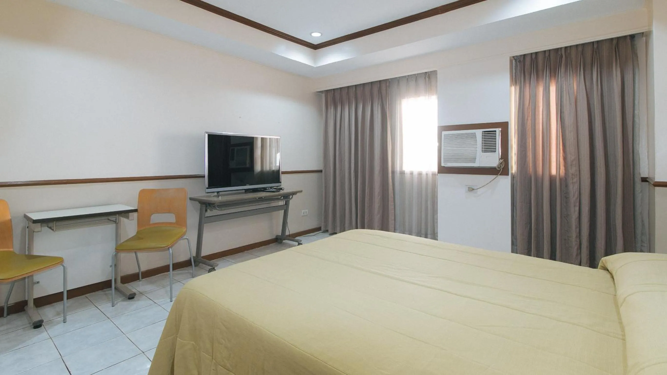 TV and multimedia, Bed in Garden Plaza Hotel Manila