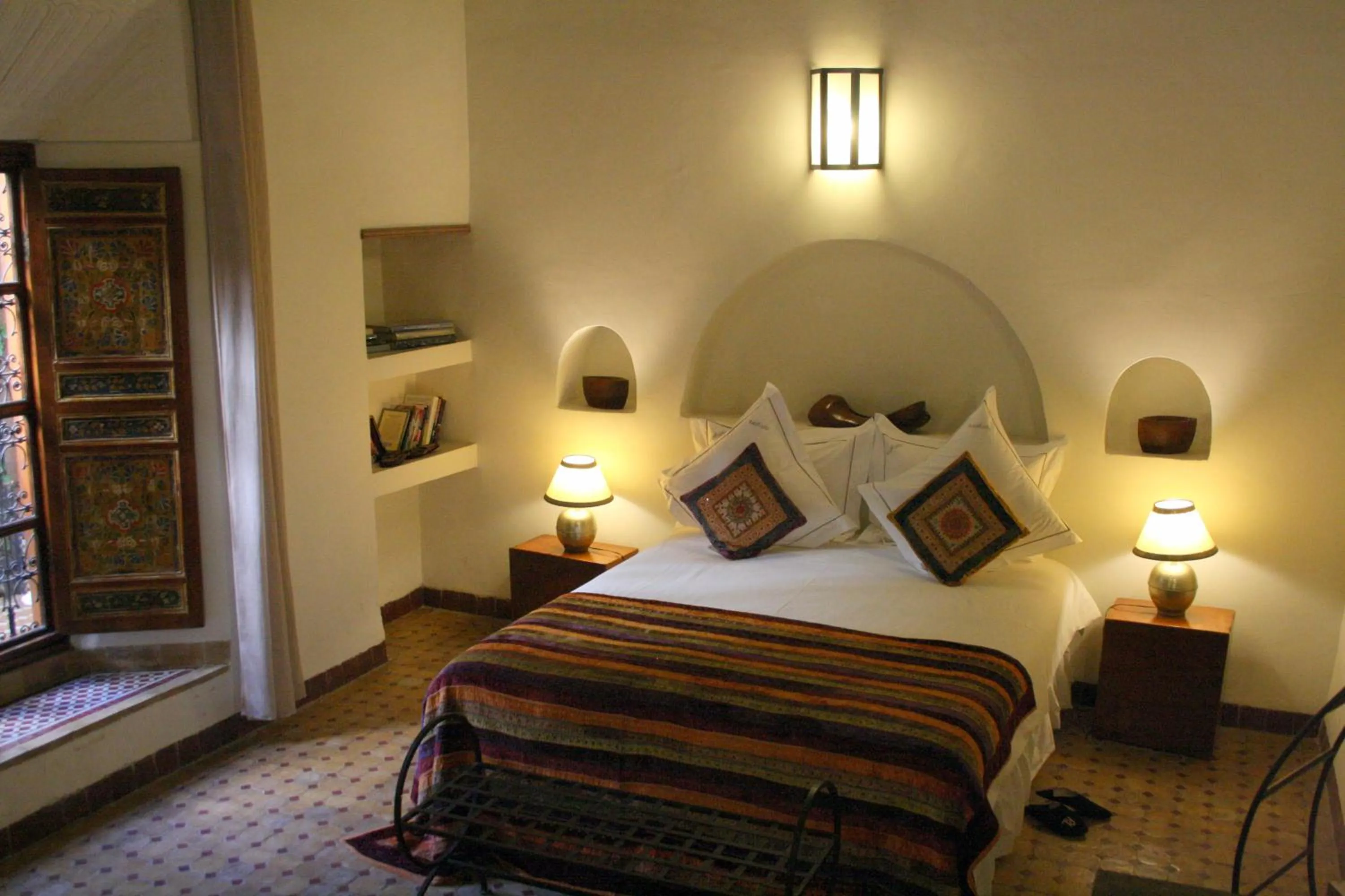 Bed in Riad Laaroussa