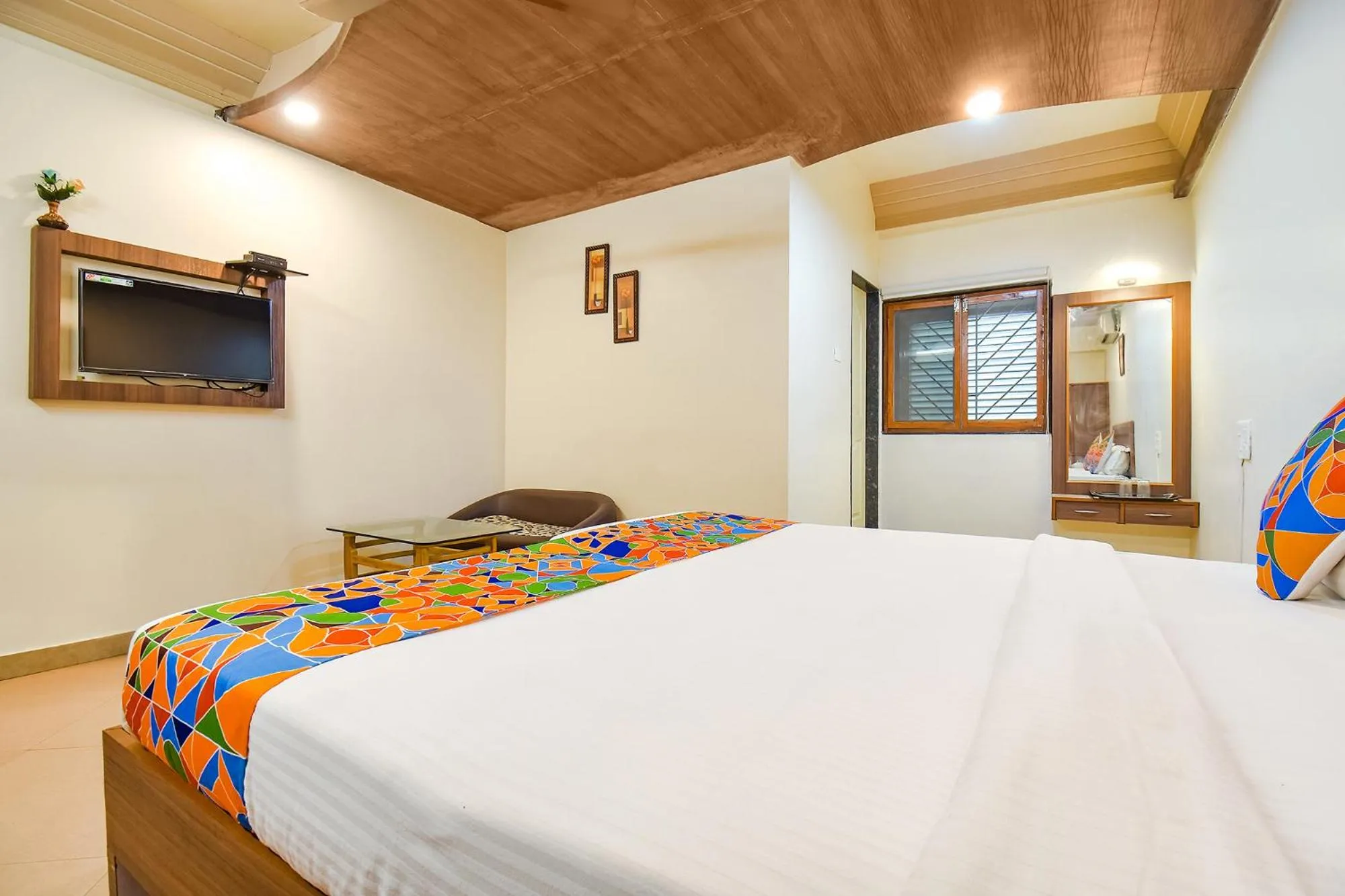 Bed in FabHotel Shreeyash Residency - Nr Spine City Mall