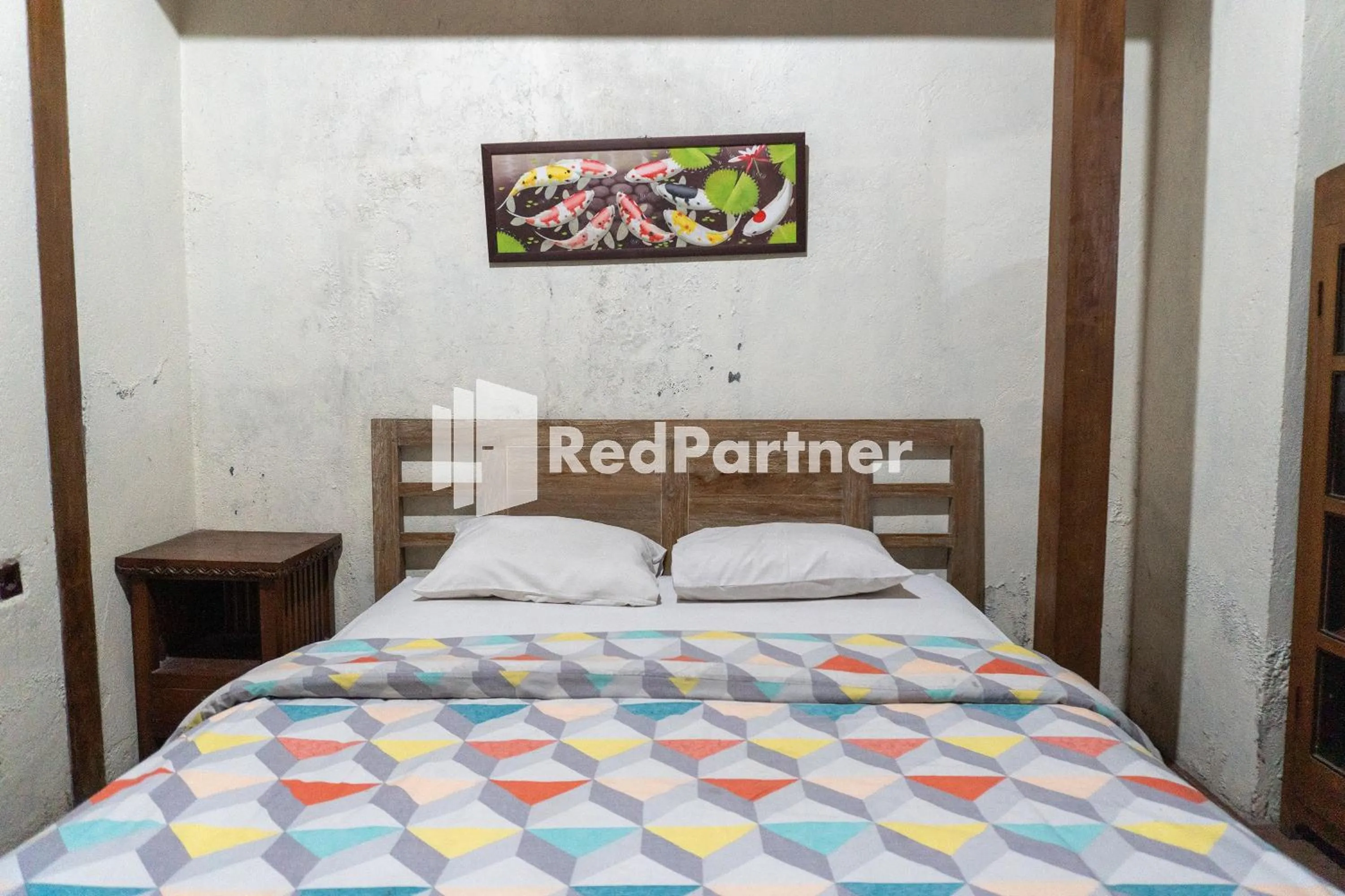 Bedroom, Bed in Javenir Hotel Tawangmangu Mitra RedDoorz