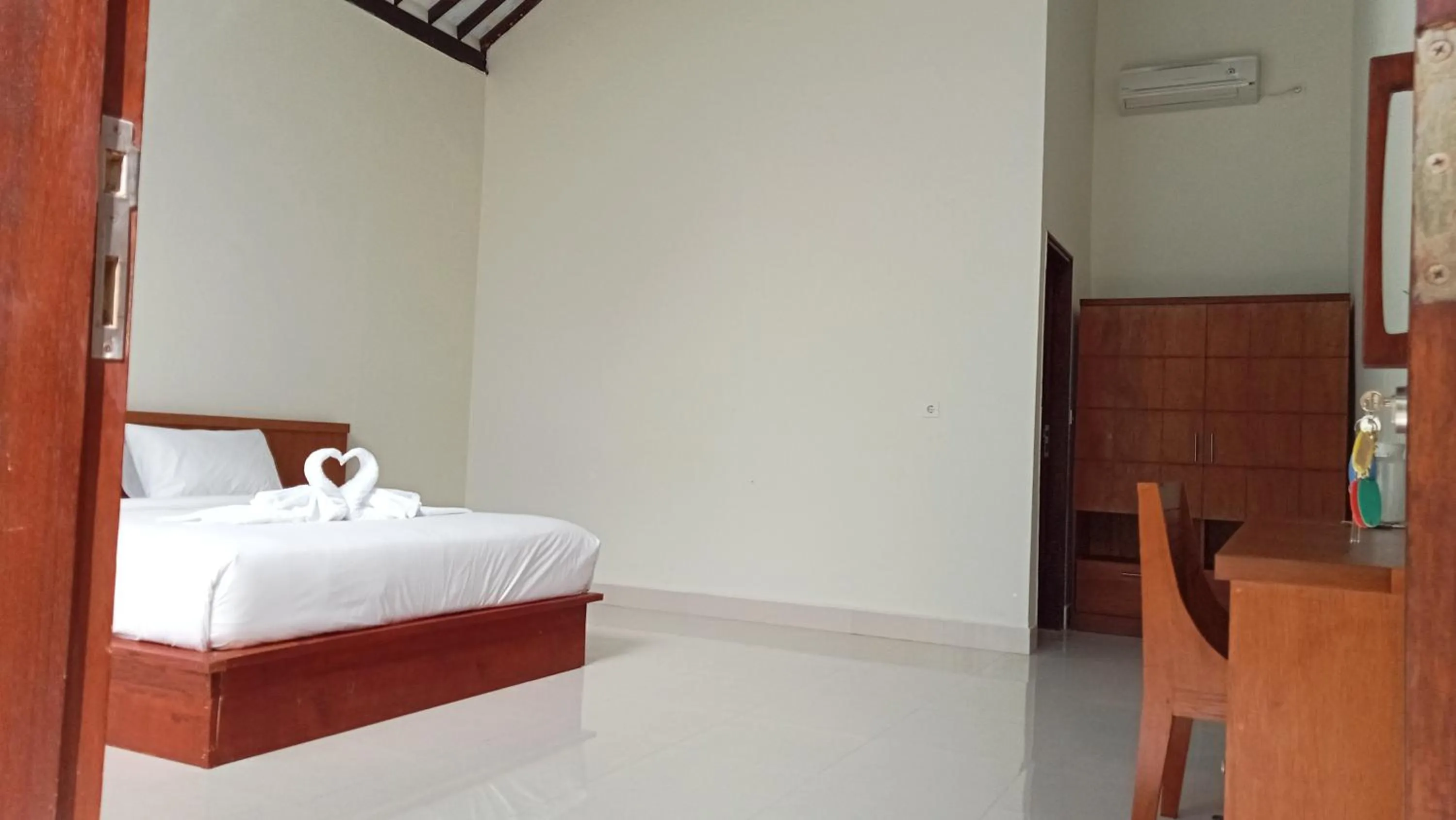 Bed in RaCottage Mandalika