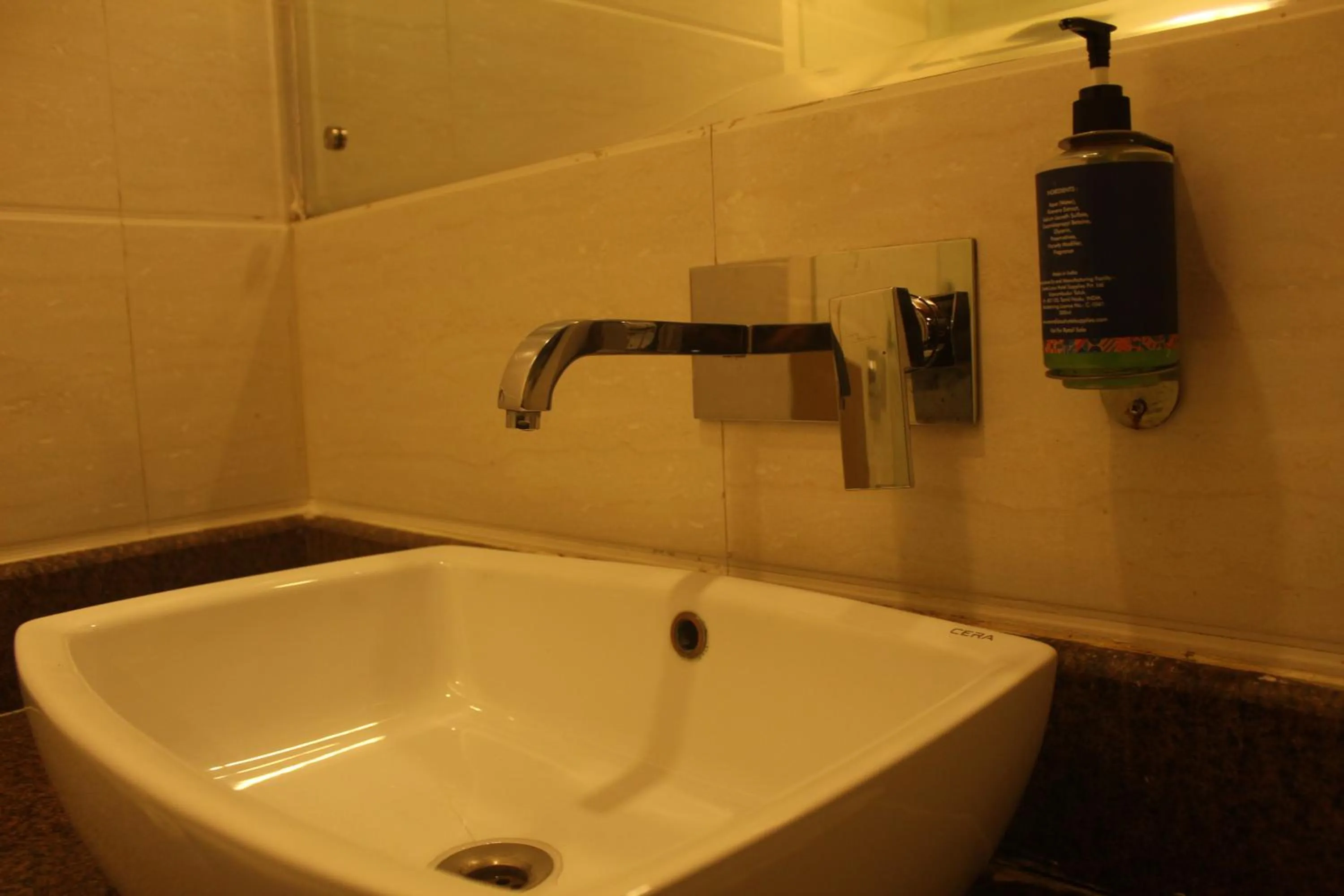 Bathroom in THE J K Hotel C R Park