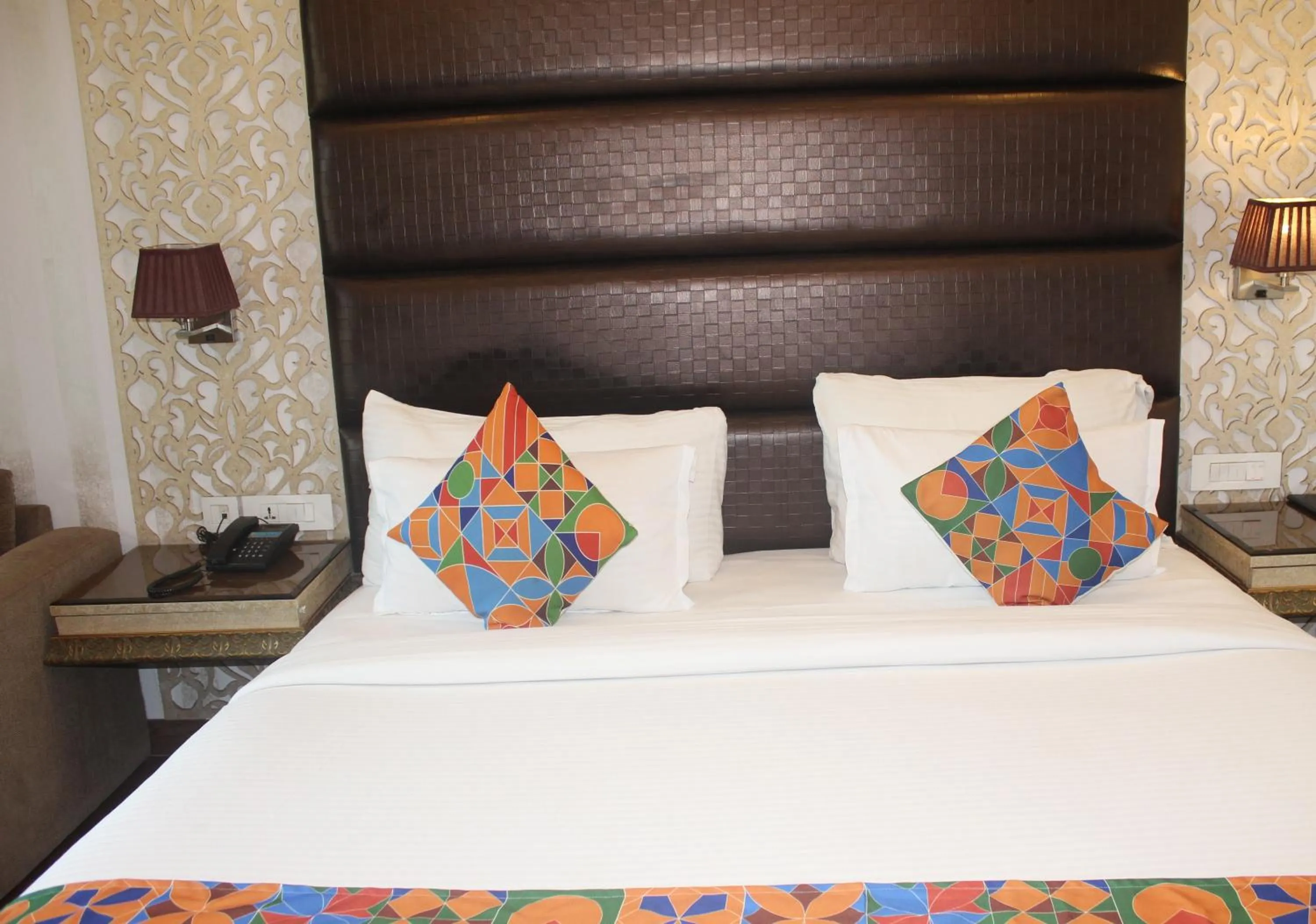 Bed in THE J K Hotel C R Park