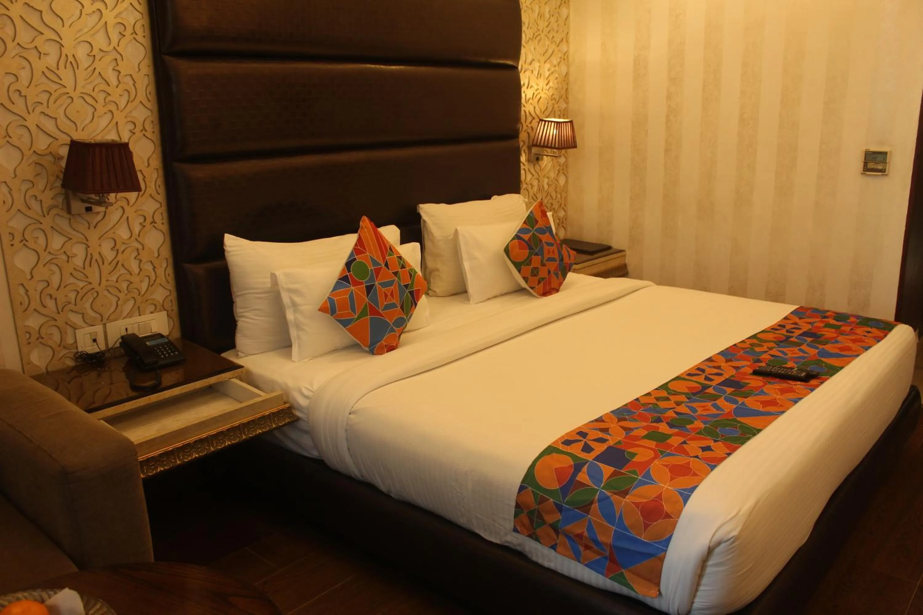 Bed in THE J K Hotel C R Park