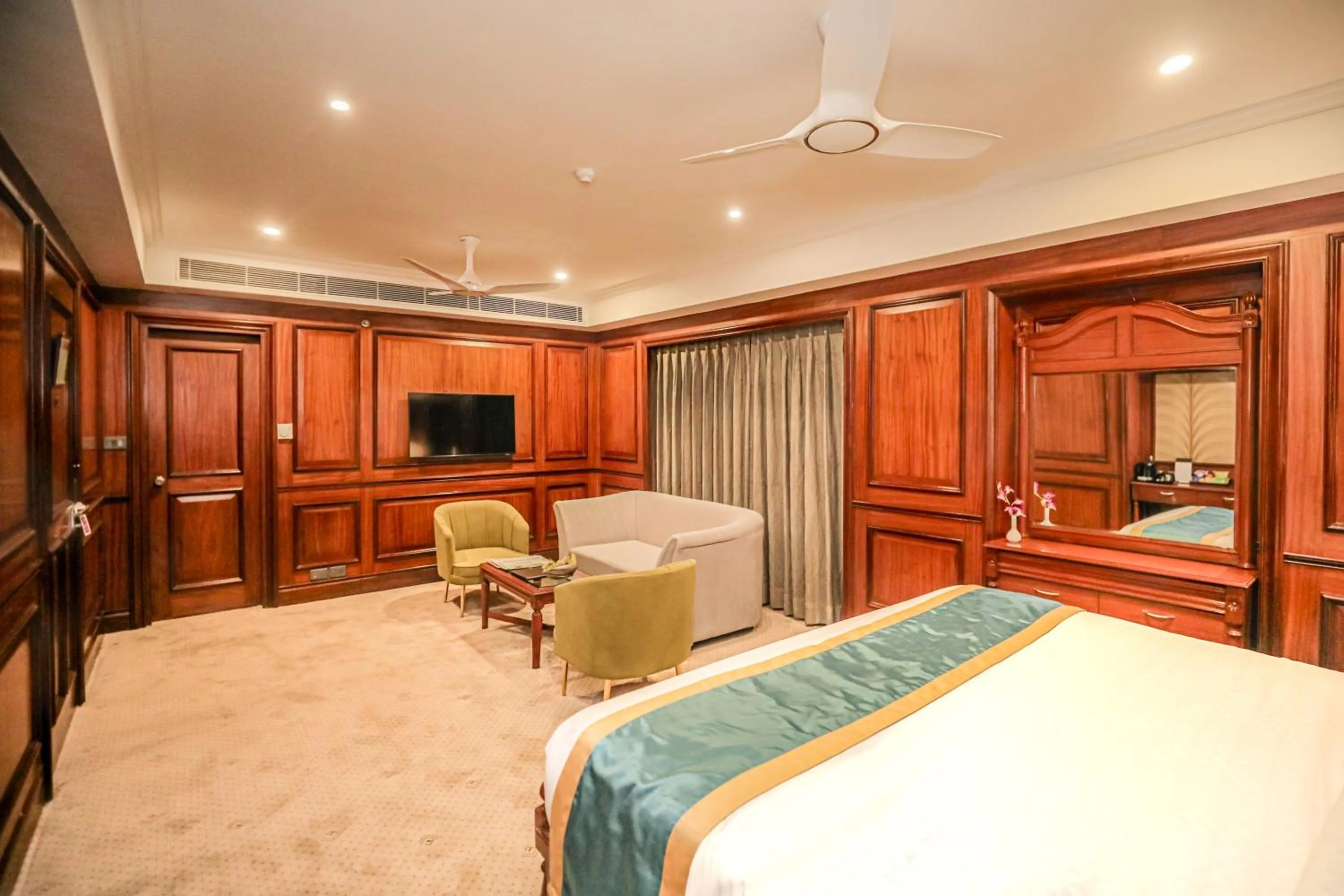 TV and multimedia, Bed in Regenta Central Lucknow by Royal Orchid Hotels Limited