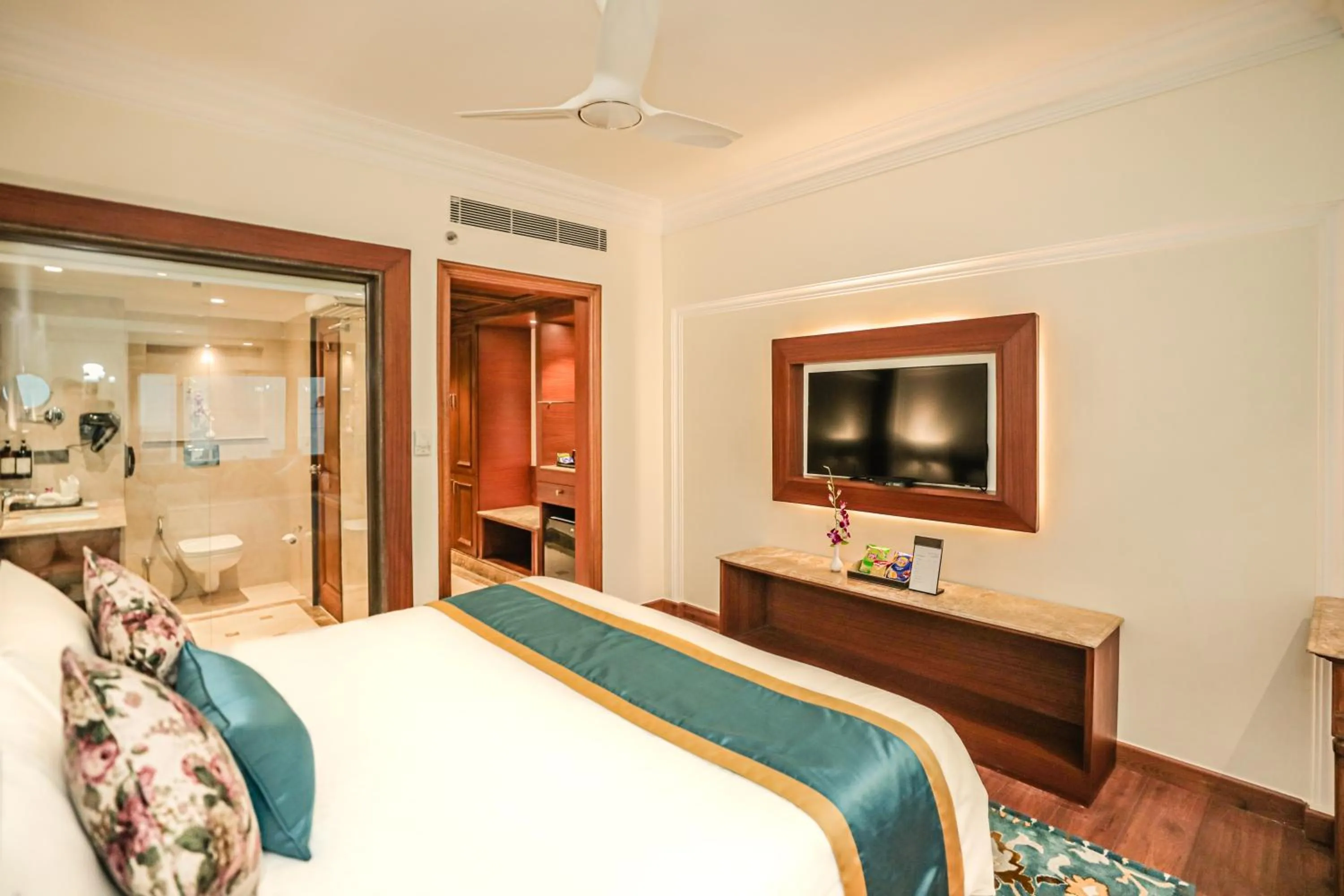 TV and multimedia, Bed in Regenta Central Lucknow by Royal Orchid Hotels Limited