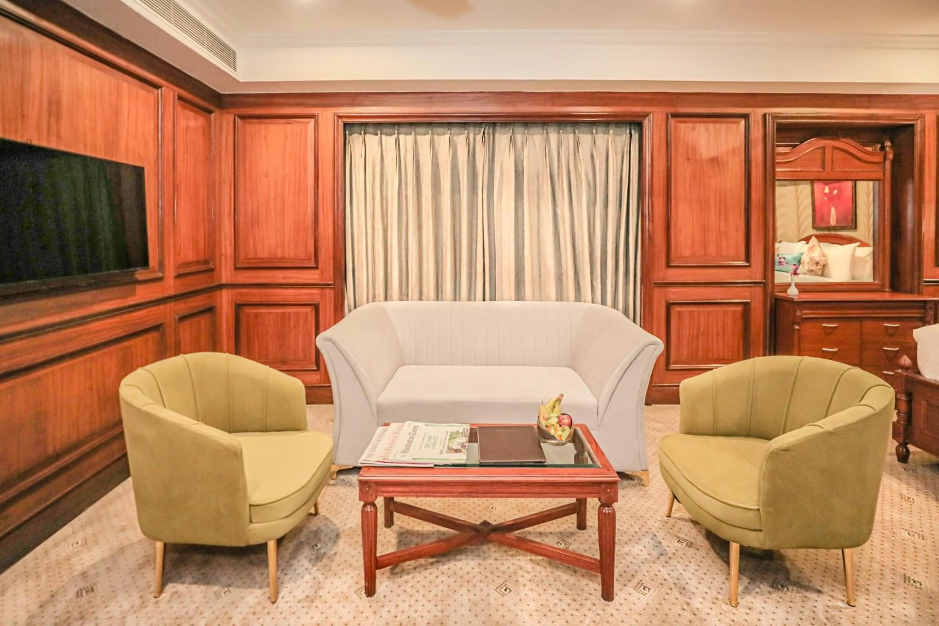 Living room in Regenta Central Lucknow by Royal Orchid Hotels Limited