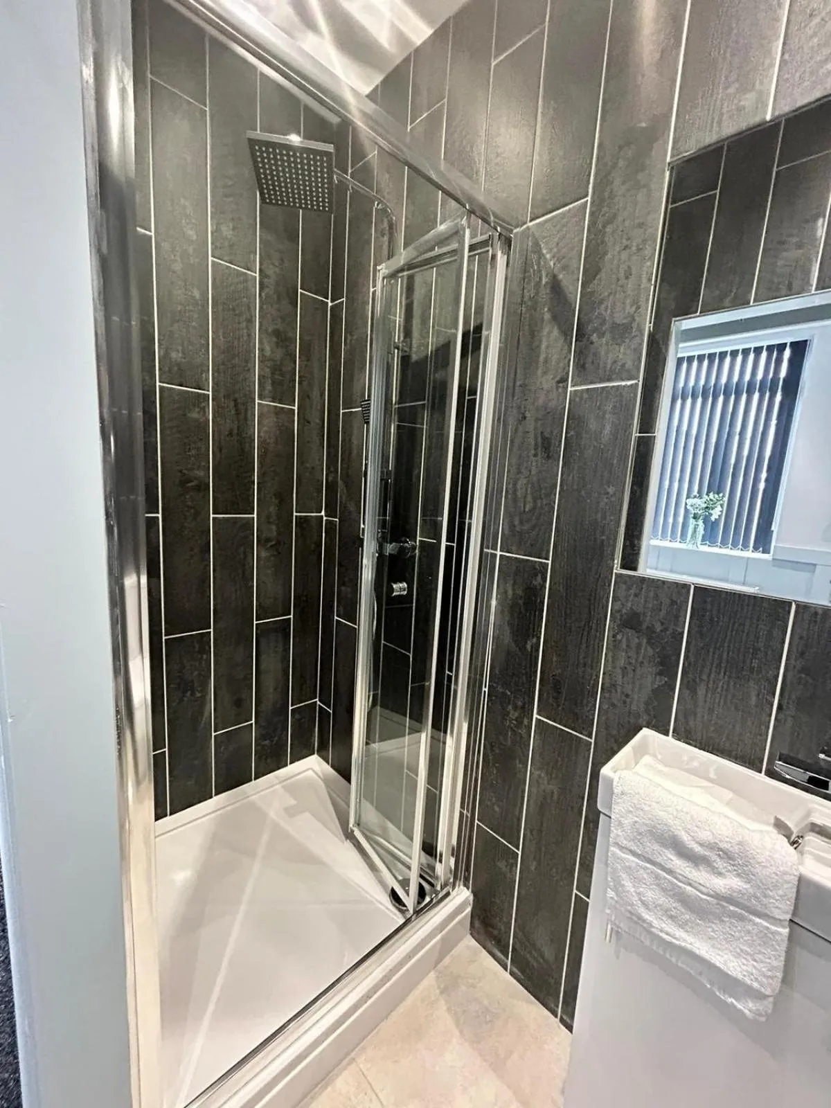 Bathroom in Sugar Hill Suite by Sasco Apartments