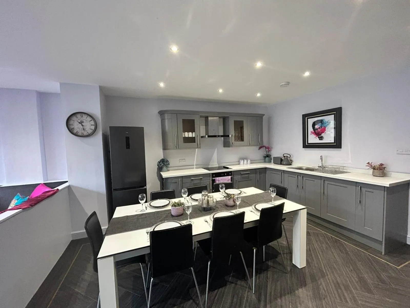 Kitchen or kitchenette in Sugar Hill Suite by Sasco Apartments