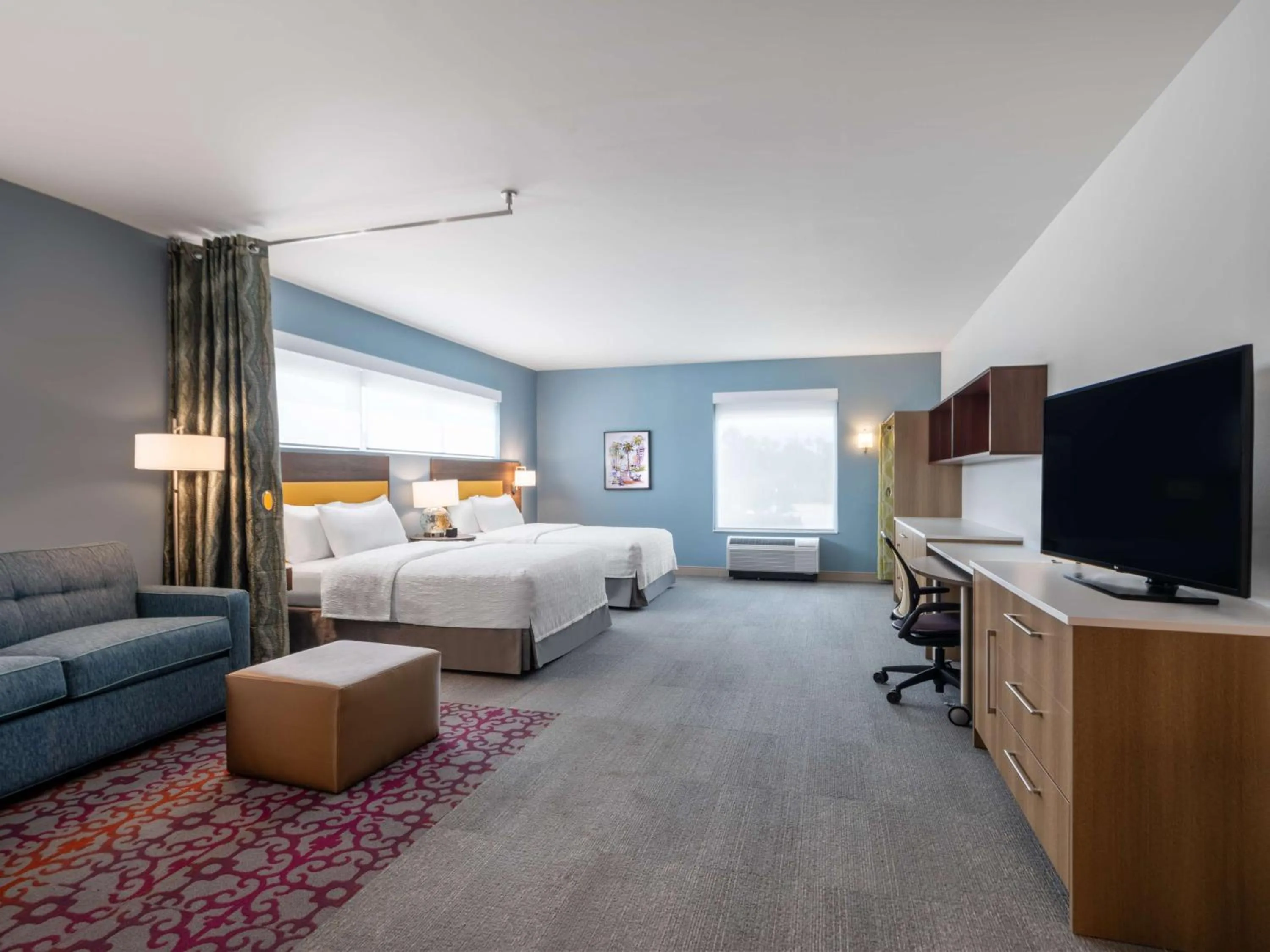 Living room, Bed in Home2 Suites By Hilton Santa Rosa Beach