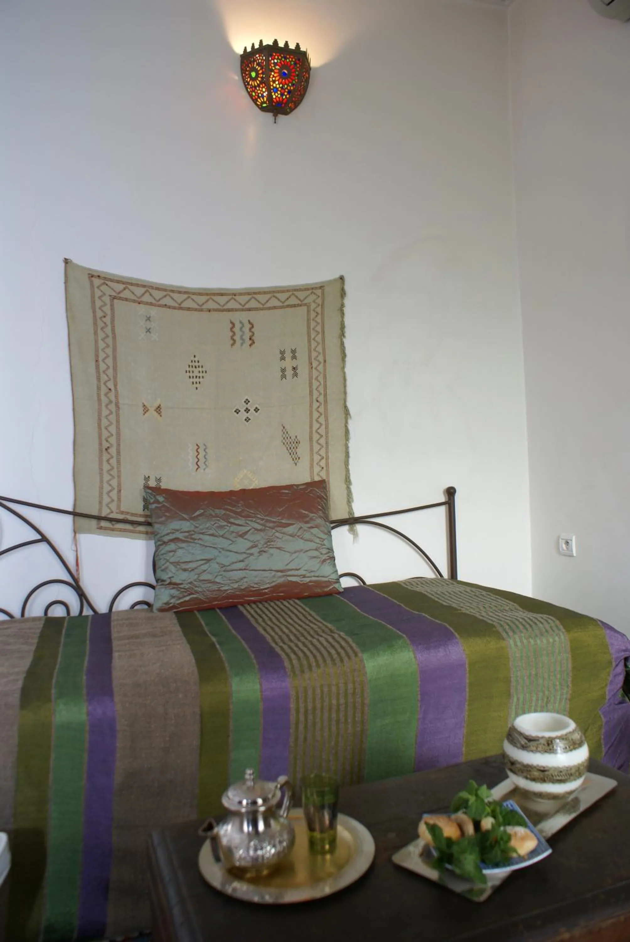 Seating area, Bed in Riad Attarine