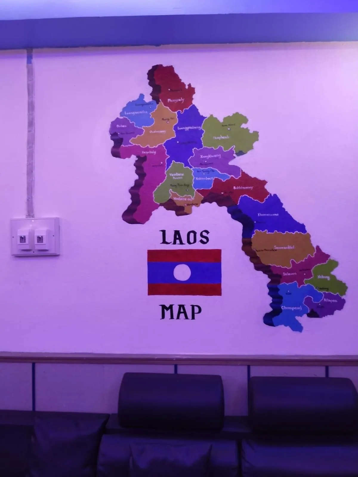 Text overlay in Rainbow Hotel Vientiane