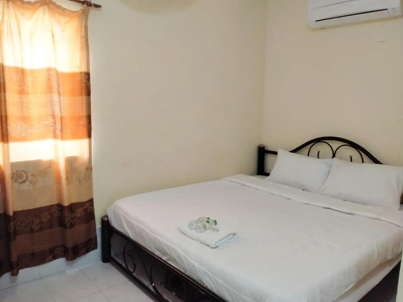 Bed in Rainbow Hotel Vientiane