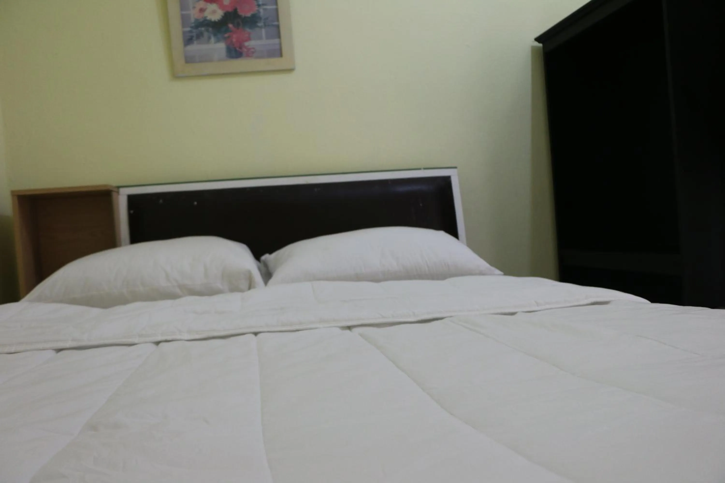 Bed in Rainbow Hotel Vientiane