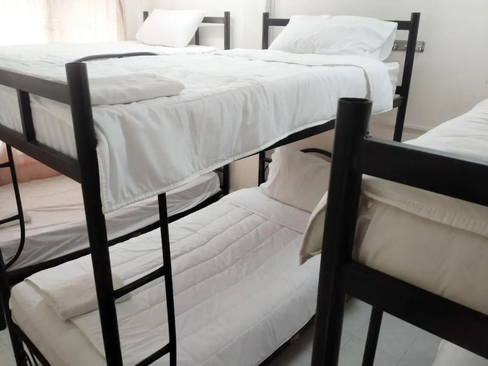 Bed in 6-Bed Dormitory Room in Rainbow Hotel Vientiane Bed in 6-Bed Dormitory Room in Rainbow Hotel Vientiane