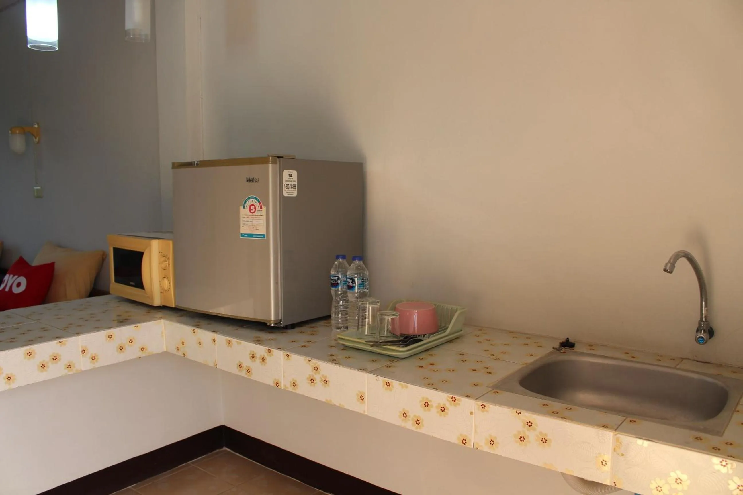 Bedroom in OYO 75420 Howto Hotel