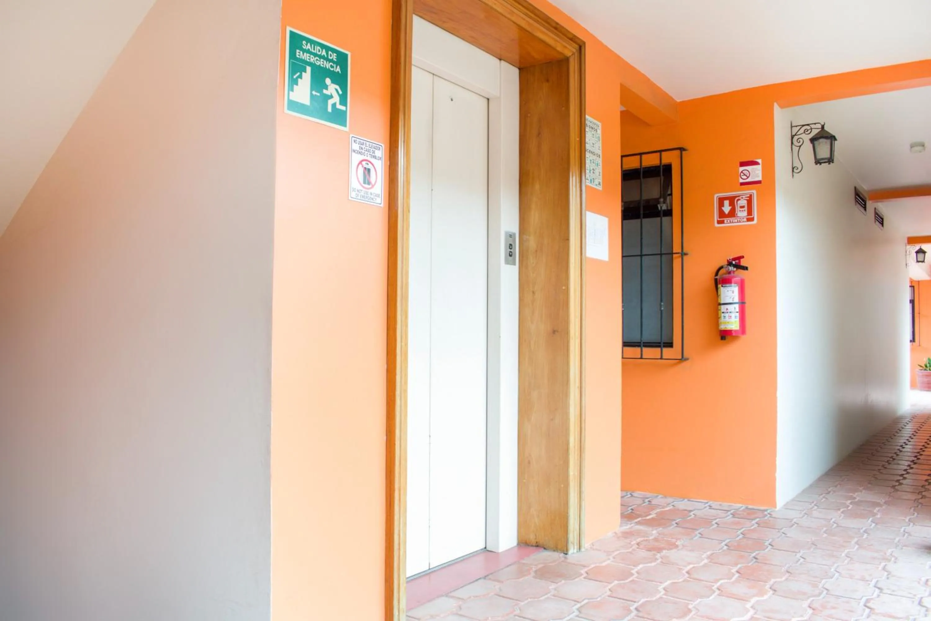 elevator in OYO Hotel Museo