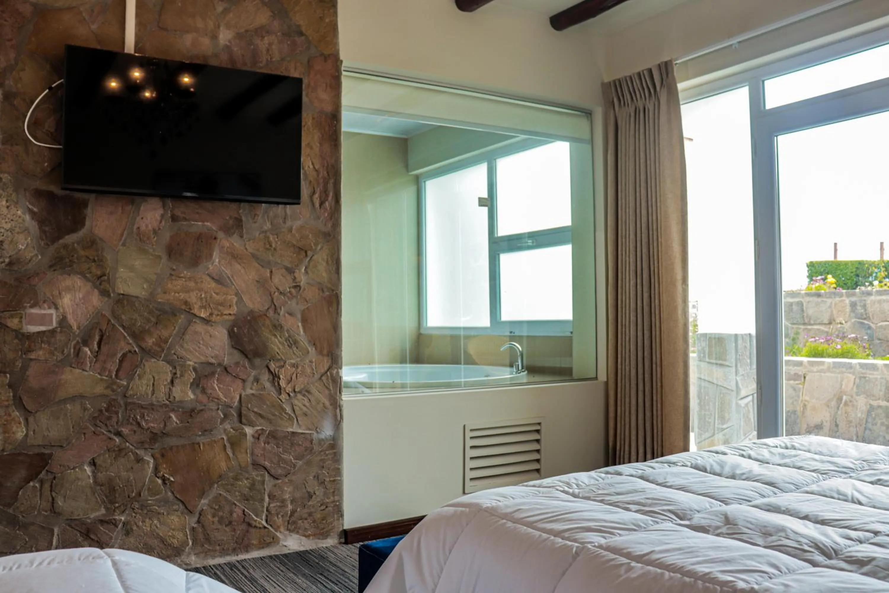 Bed in Hotel Puerta del Sol Colca