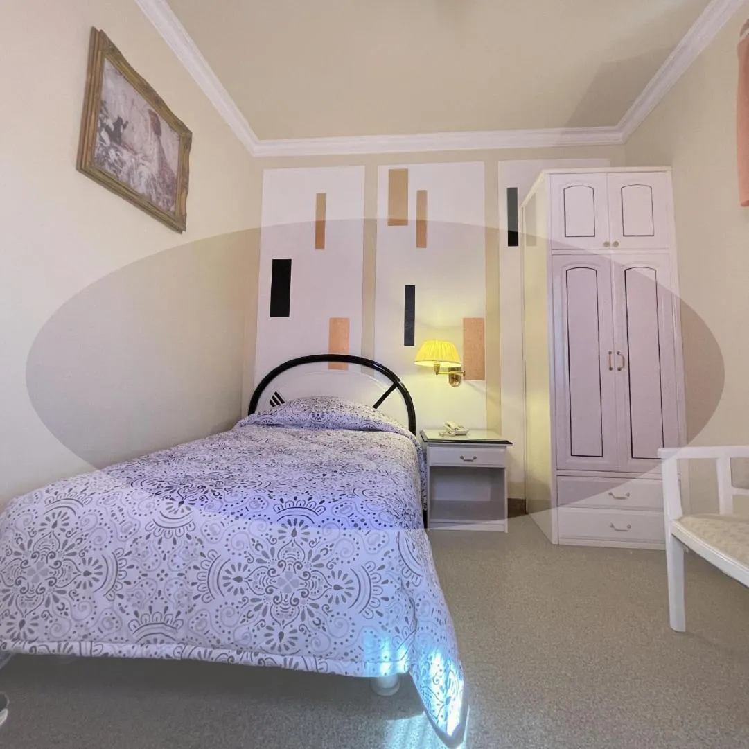 Bed in Hotel Kokusai