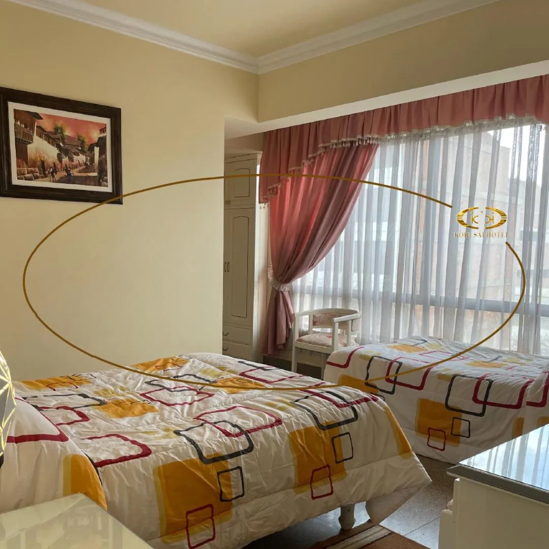 Bed in Hotel Kokusai