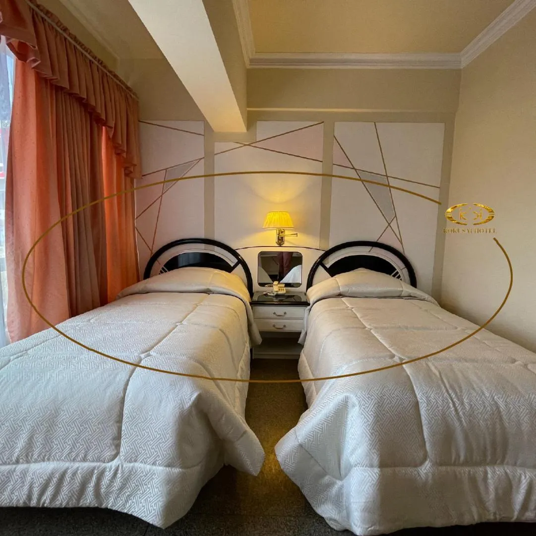 Bed in Hotel Kokusai