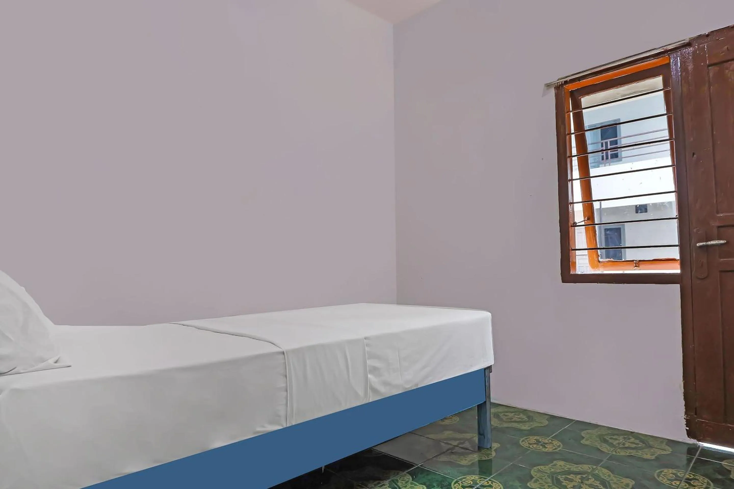 Bedroom, Bed in Hotel O City Kost Syariah