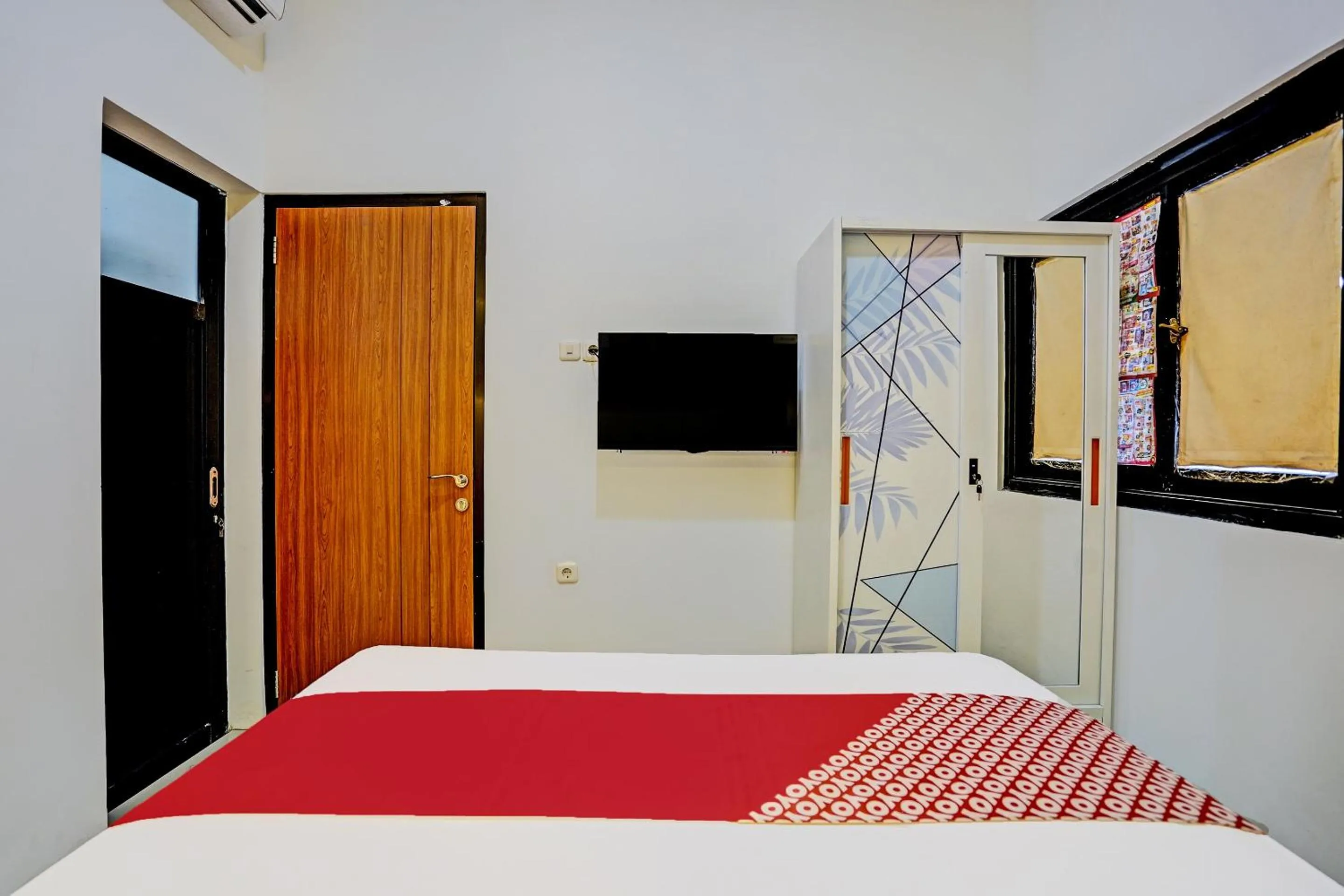 Bedroom in Hotel O Sunlo Cozy Home Family Homestay Syariah