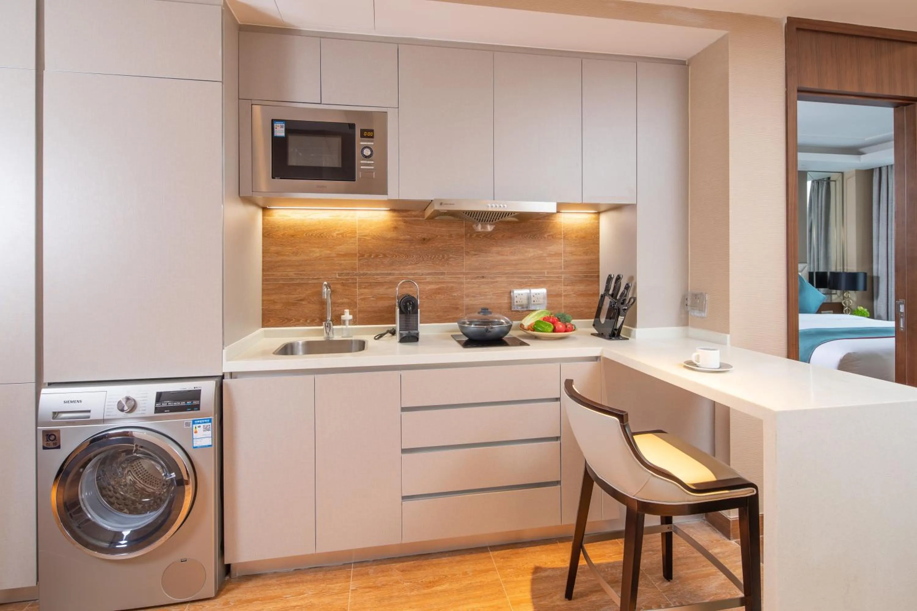 Kitchen or kitchenette in Rocase Boutique Hotel Wuxi