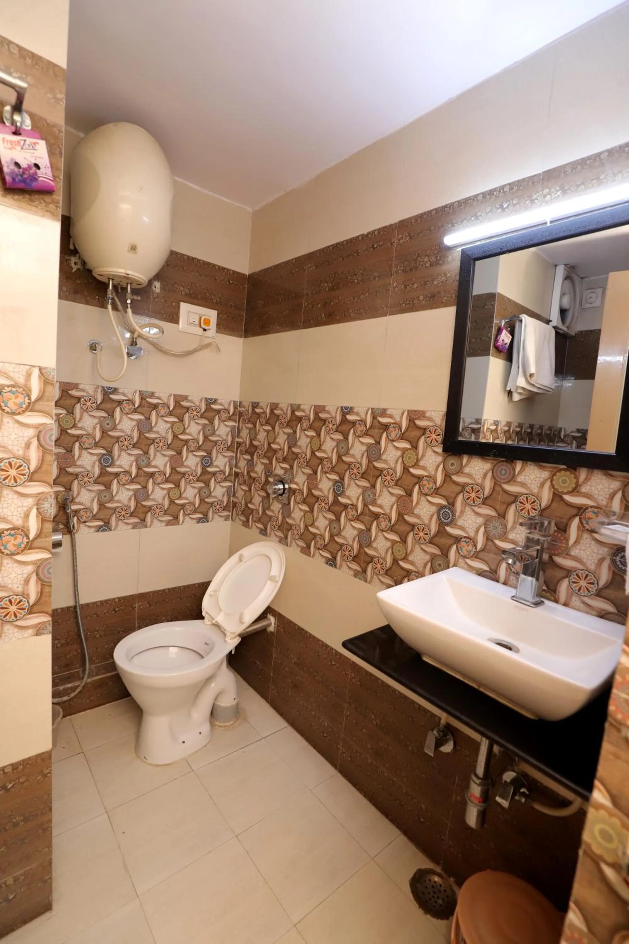 Toilet in Hotel Green View International