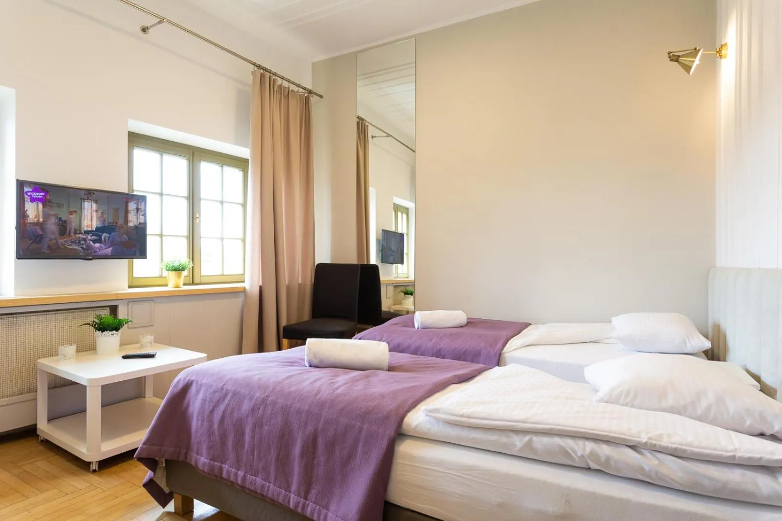 Bed in Moon Apartments Gdańsk