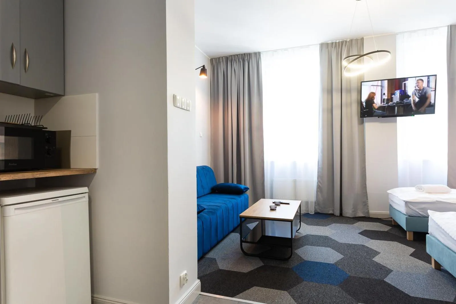 Bed in Moon Apartments Gdańsk