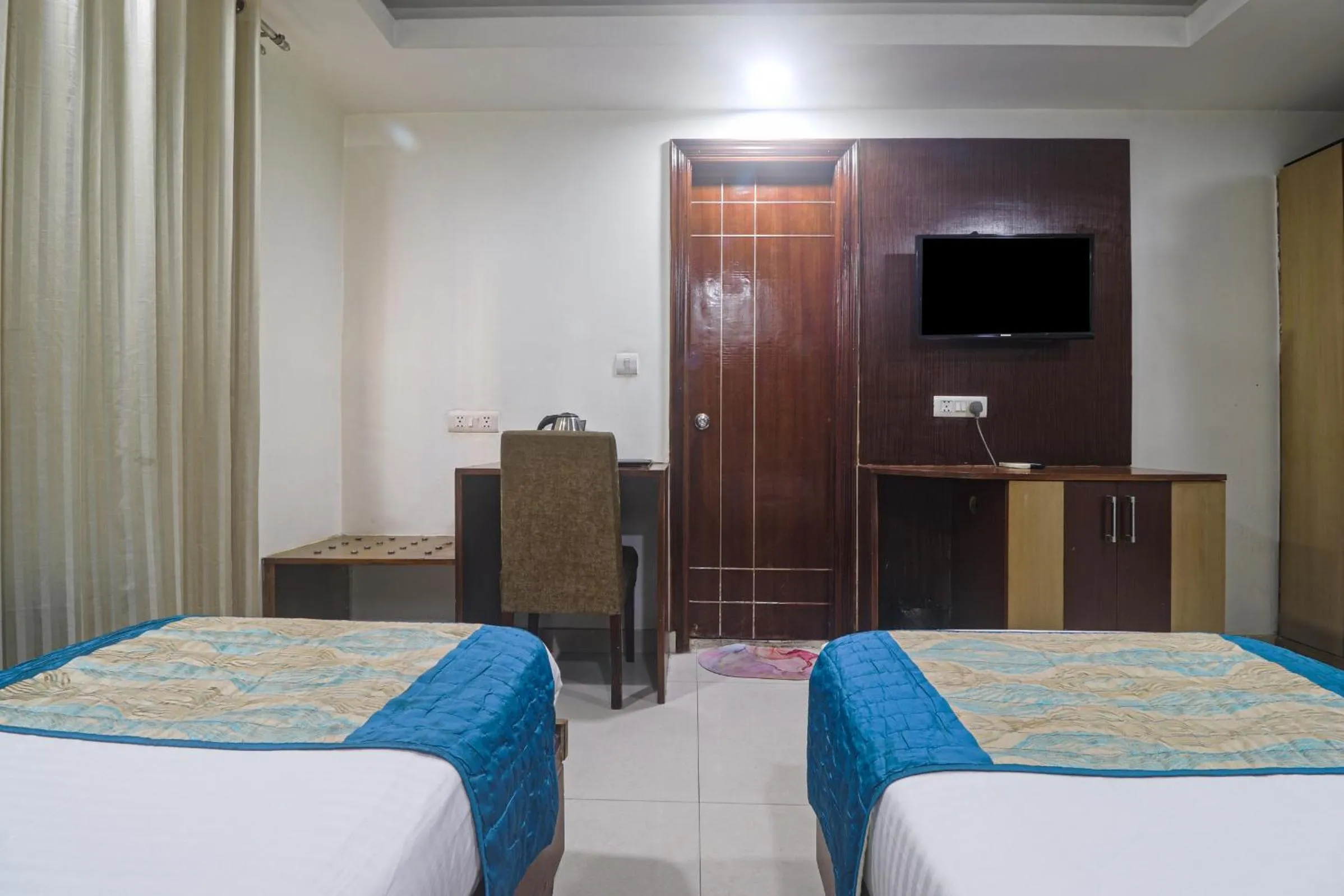 Bed in Hotel Sizzling Starr