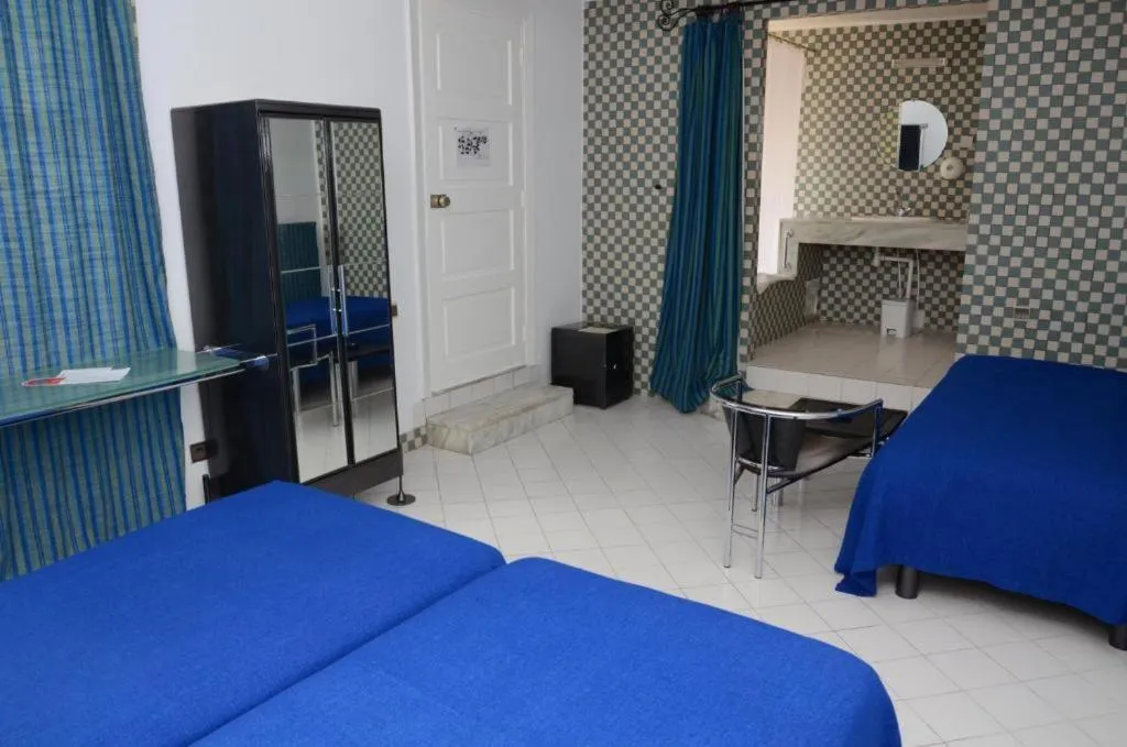 Bed in Appart-Hôtel Tagadirt