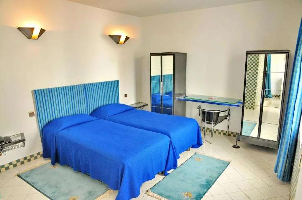 Bed in Appart-Hôtel Tagadirt