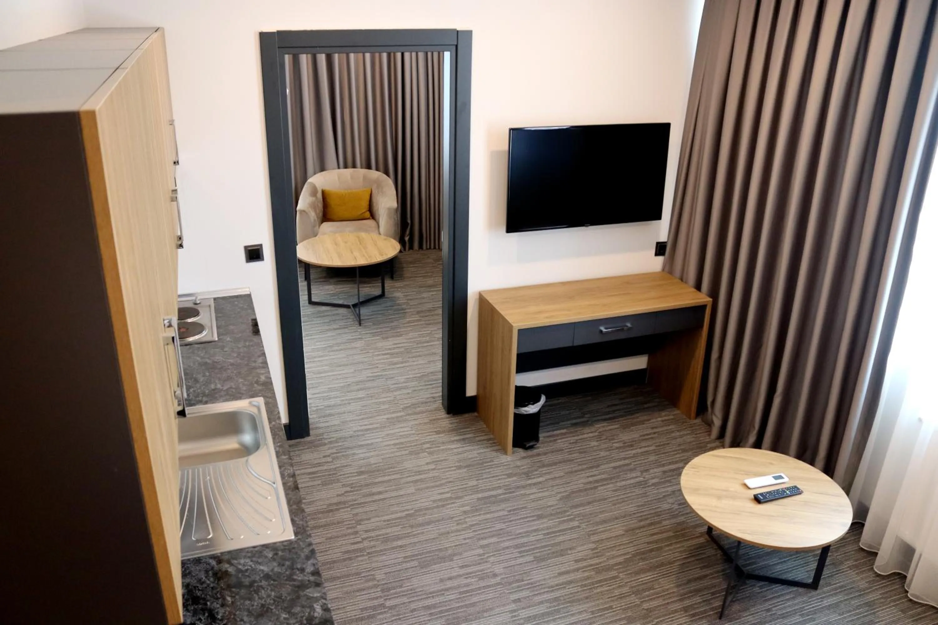 Living room in HOME PLUS Hotel