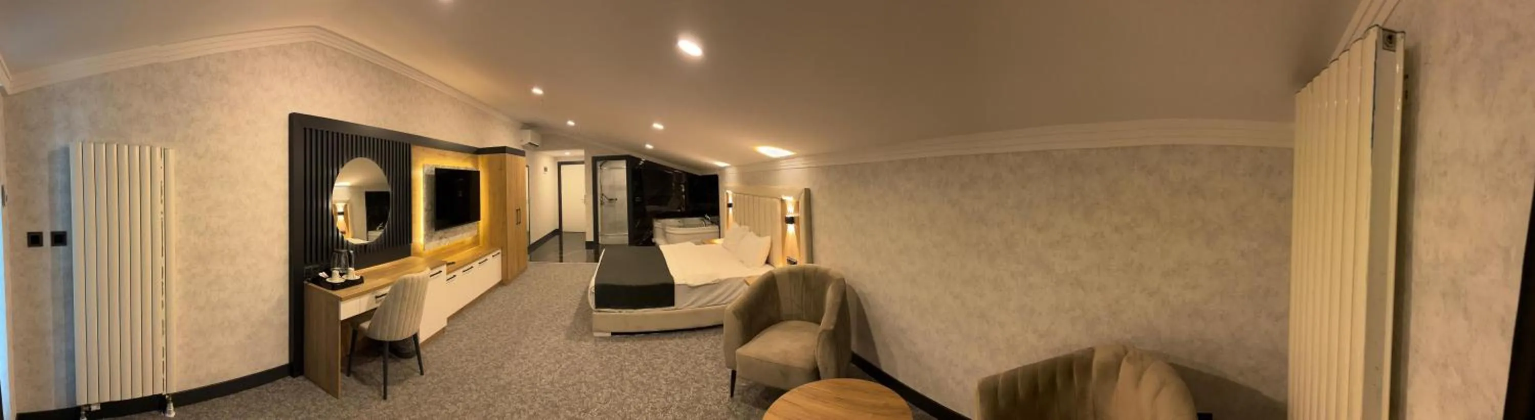 Bed in HOME PLUS Hotel