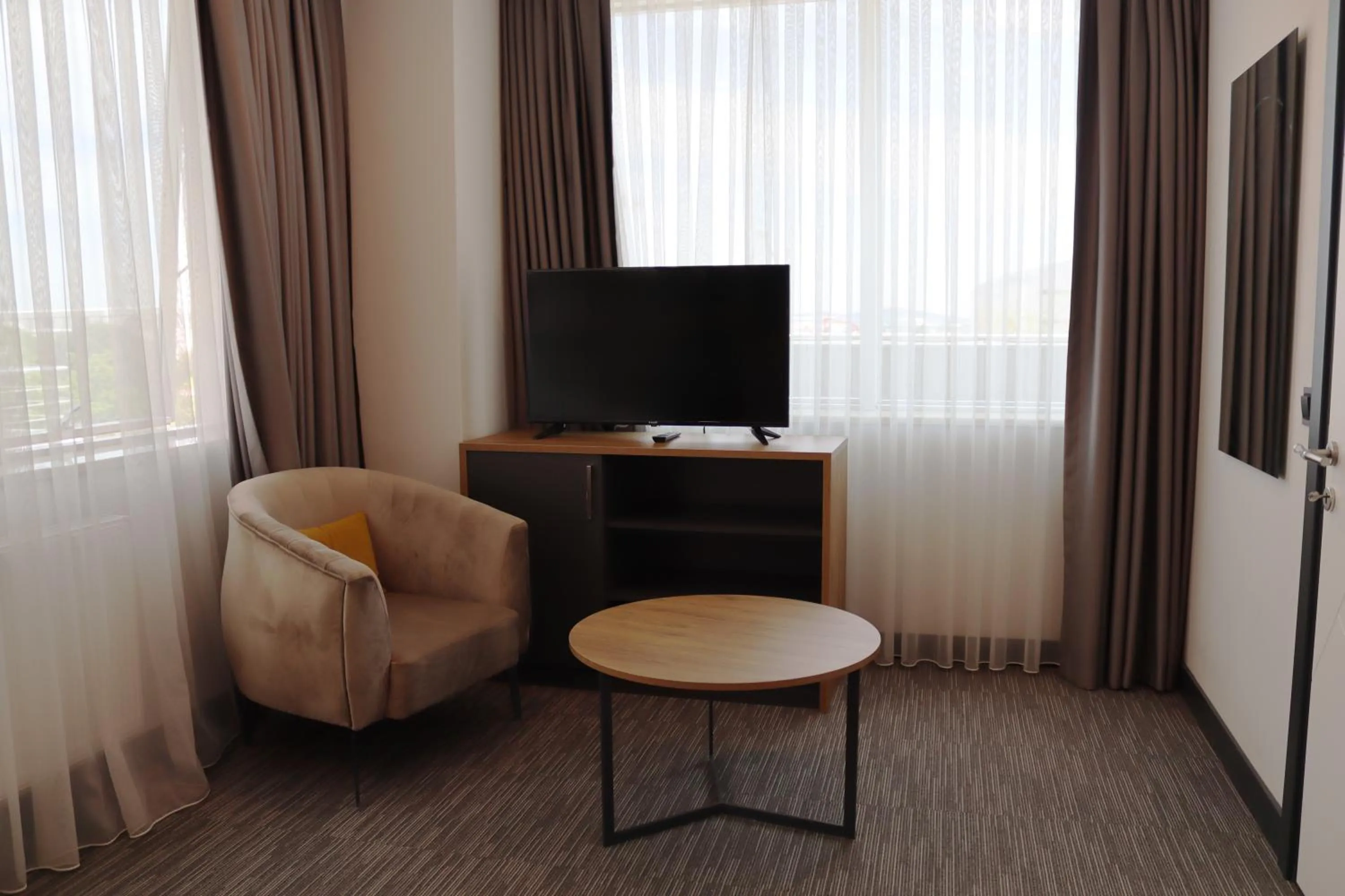 Seating area in HOME PLUS Hotel