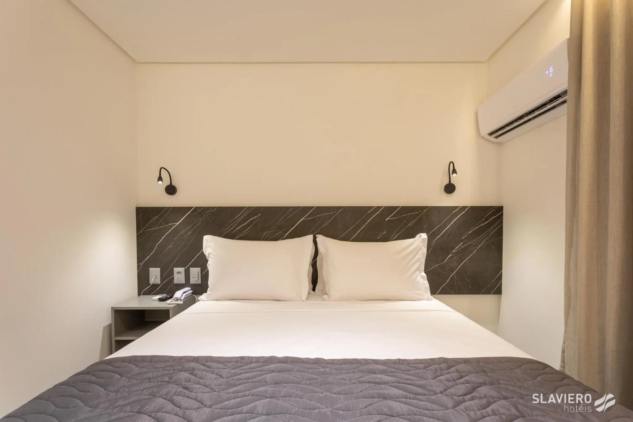 Bed in Slaviero João Pessoa