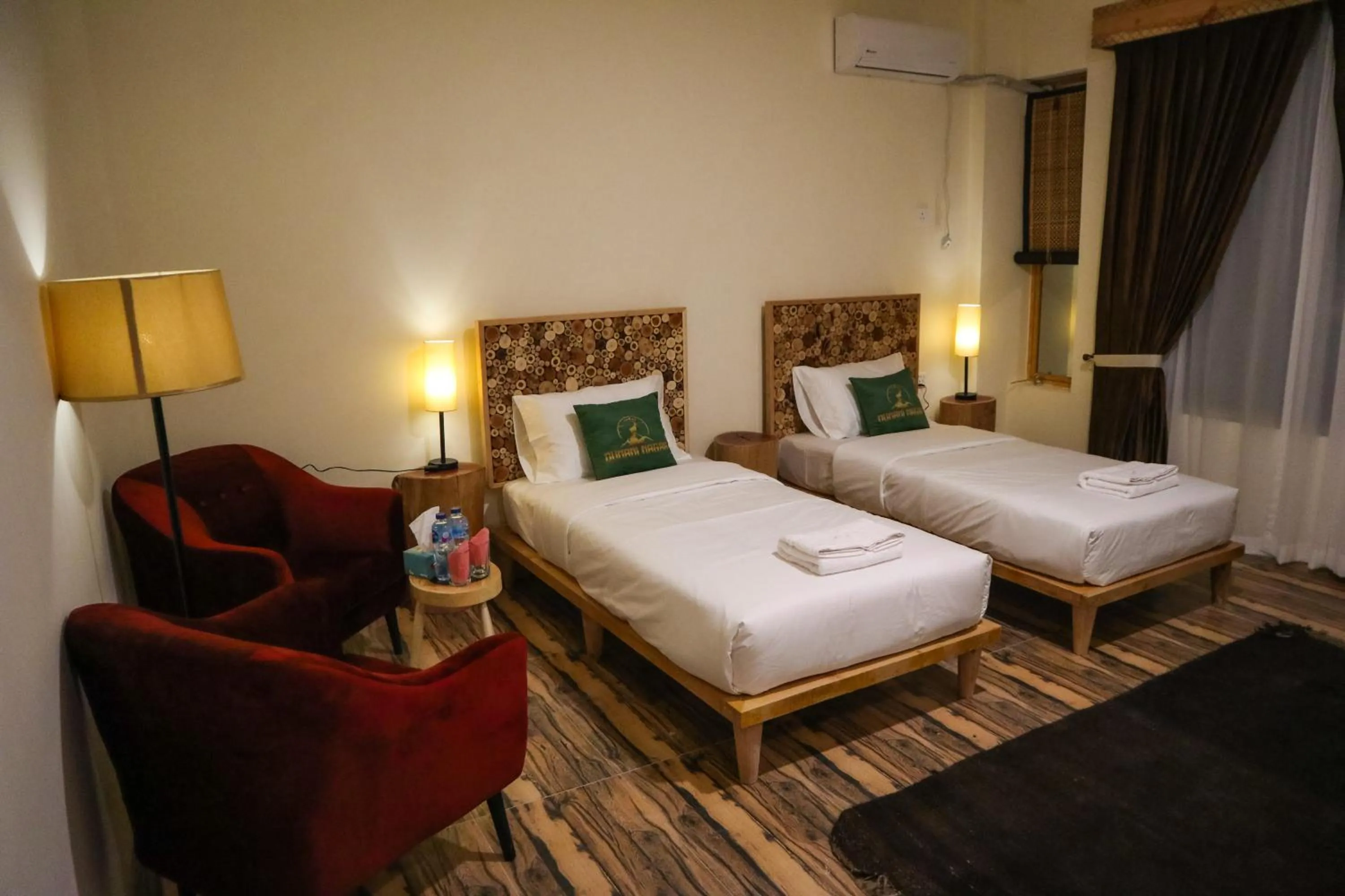 Bed in Dumani Nagar Hotel & Resort