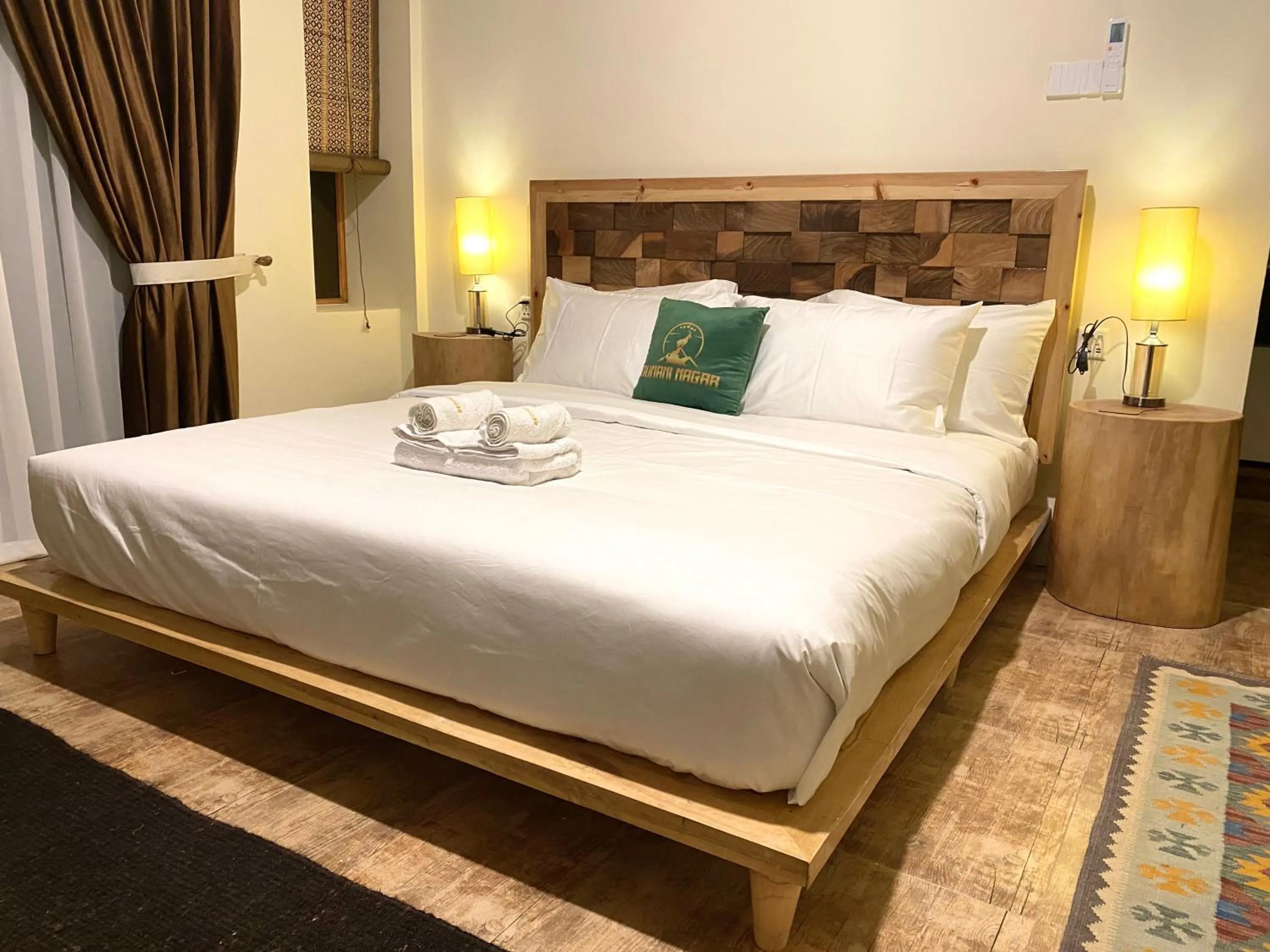 Bed in Dumani Nagar Hotel & Resort