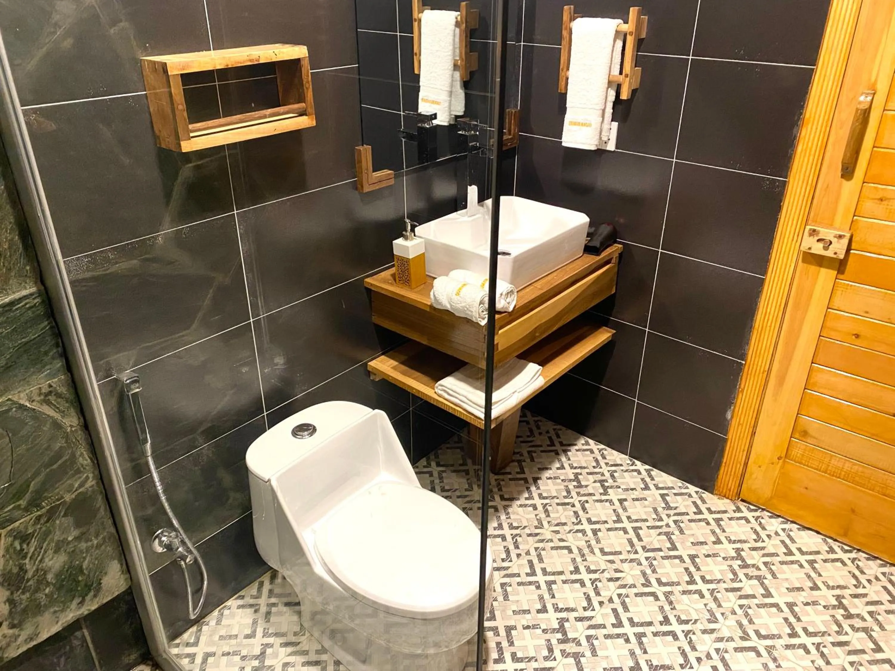 Bathroom in Dumani Nagar Hotel & Resort