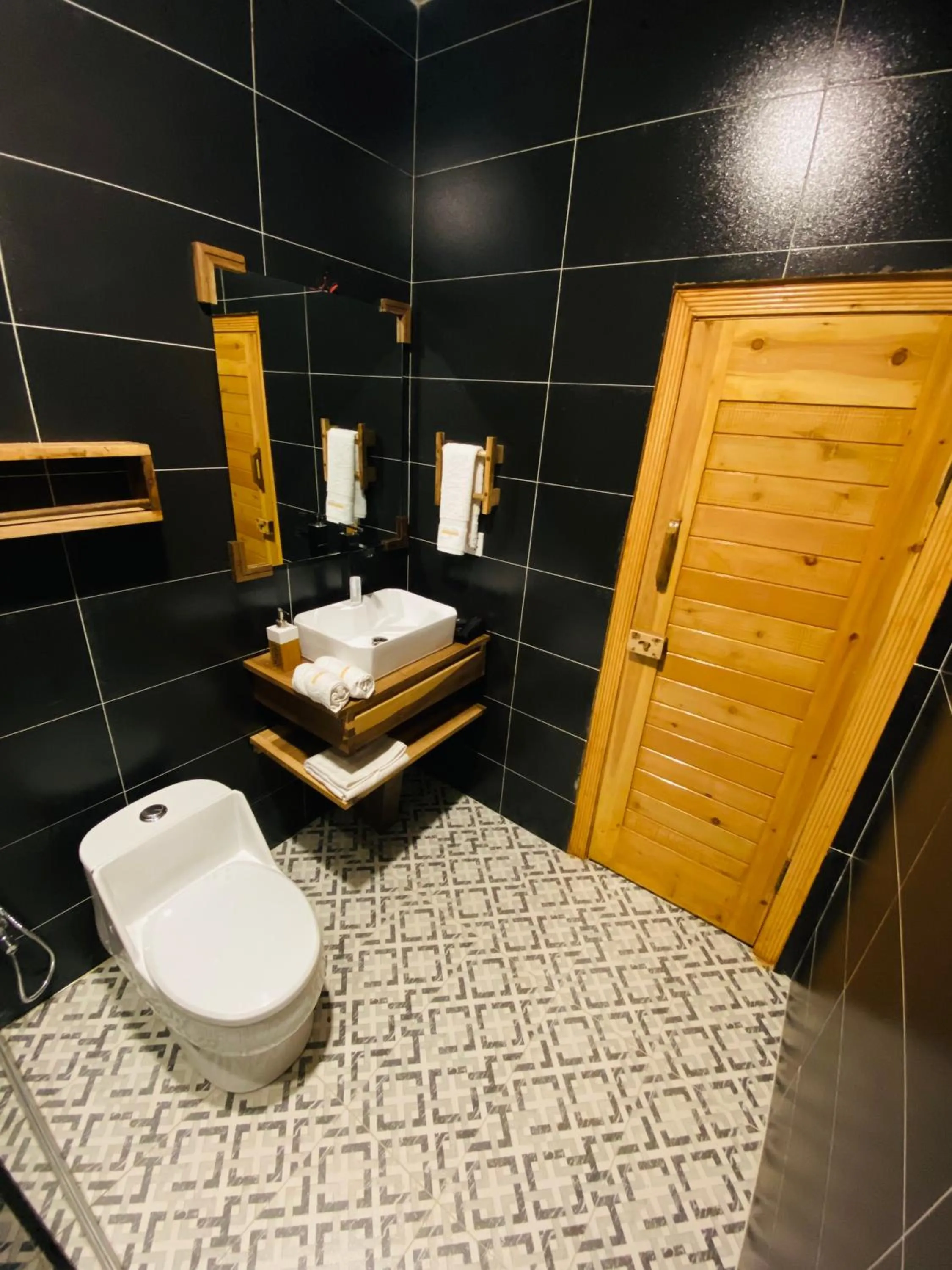 Bathroom in Dumani Nagar Hotel & Resort