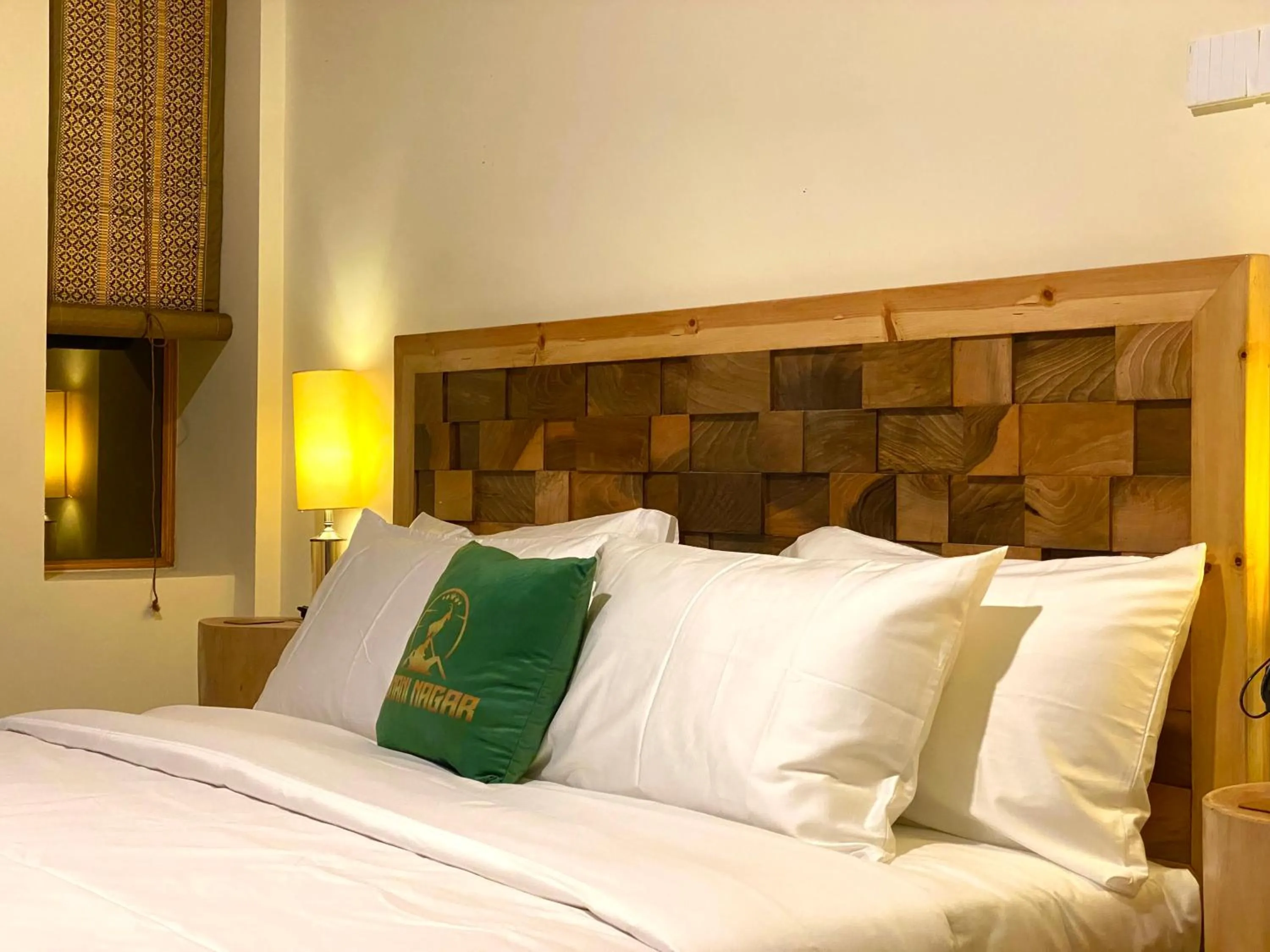 Bed in Dumani Nagar Hotel & Resort