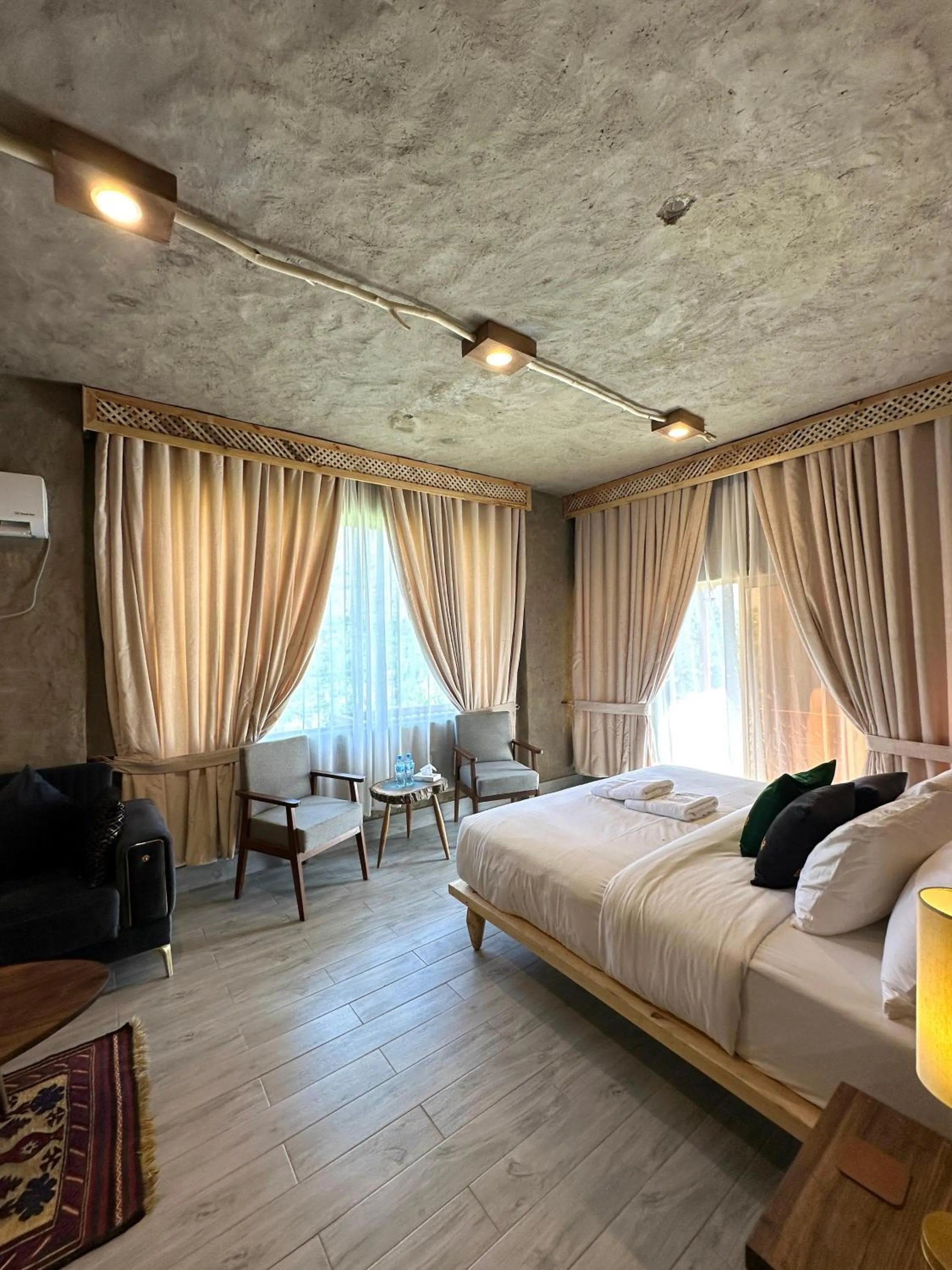 Bed in Dumani Nagar Hotel & Resort