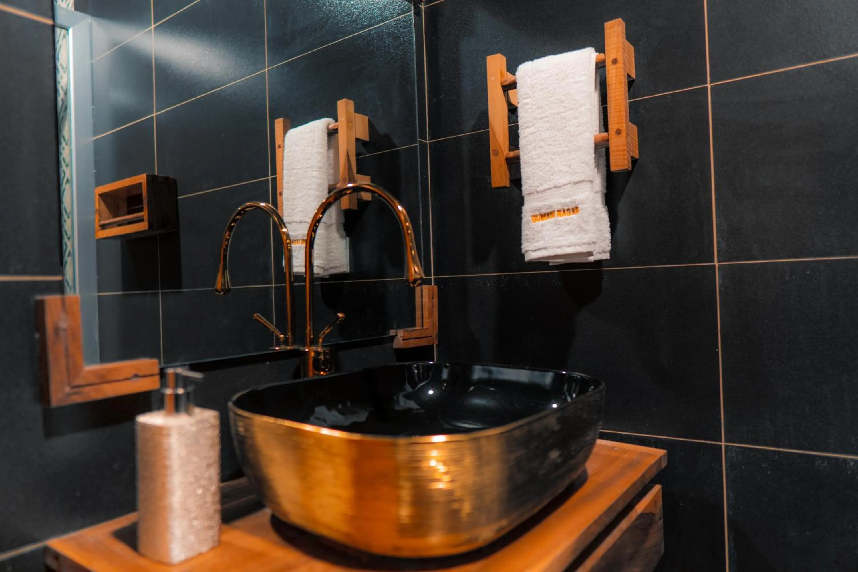 Bathroom in Dumani Nagar Hotel & Resort