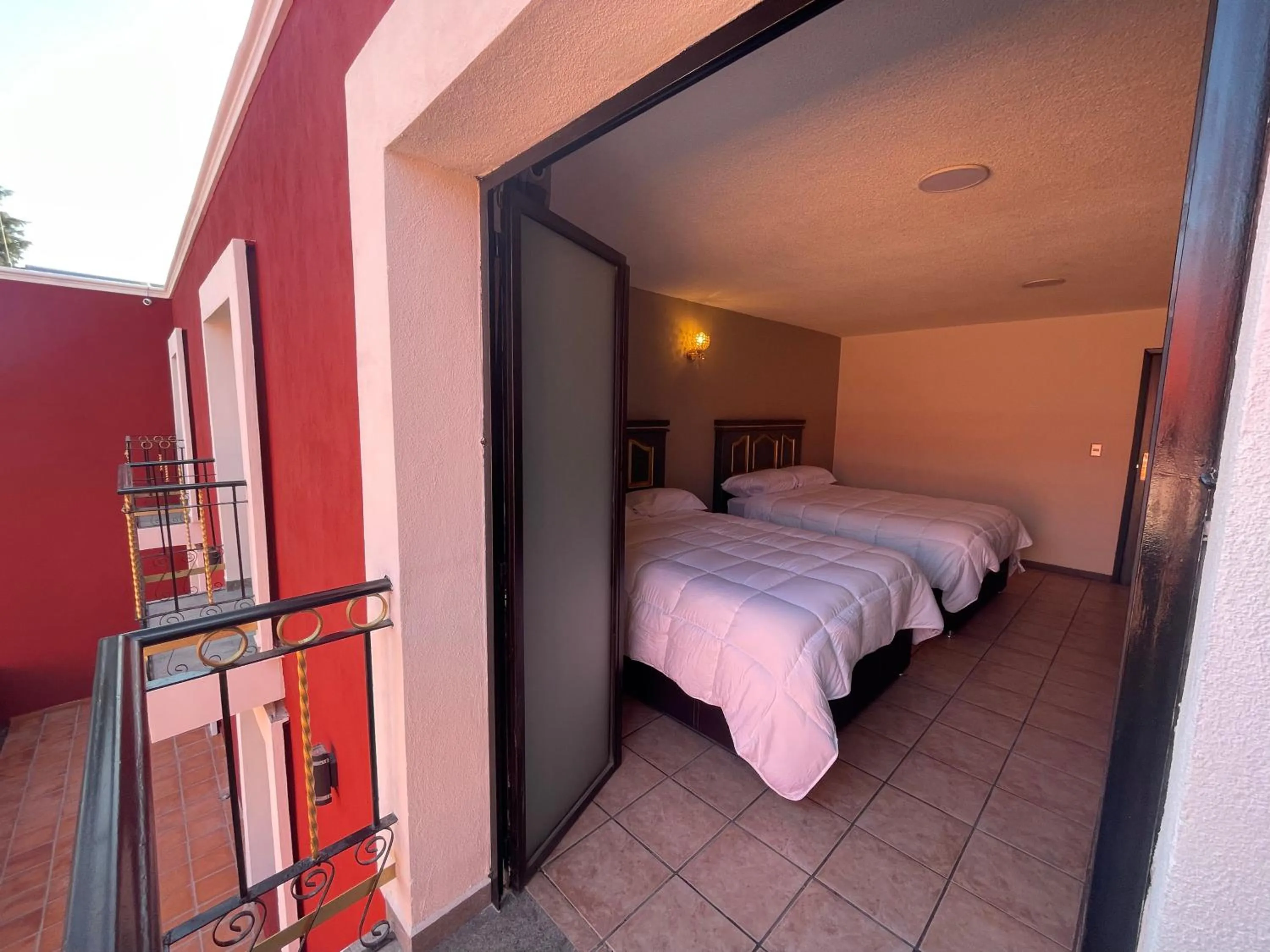Balcony/Terrace, Bed in Hotel Casa Real Cholula
